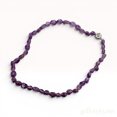 Natural Tumbled Amethyst Bead Necklace with Silver Floral Clasp. A single strand necklace 