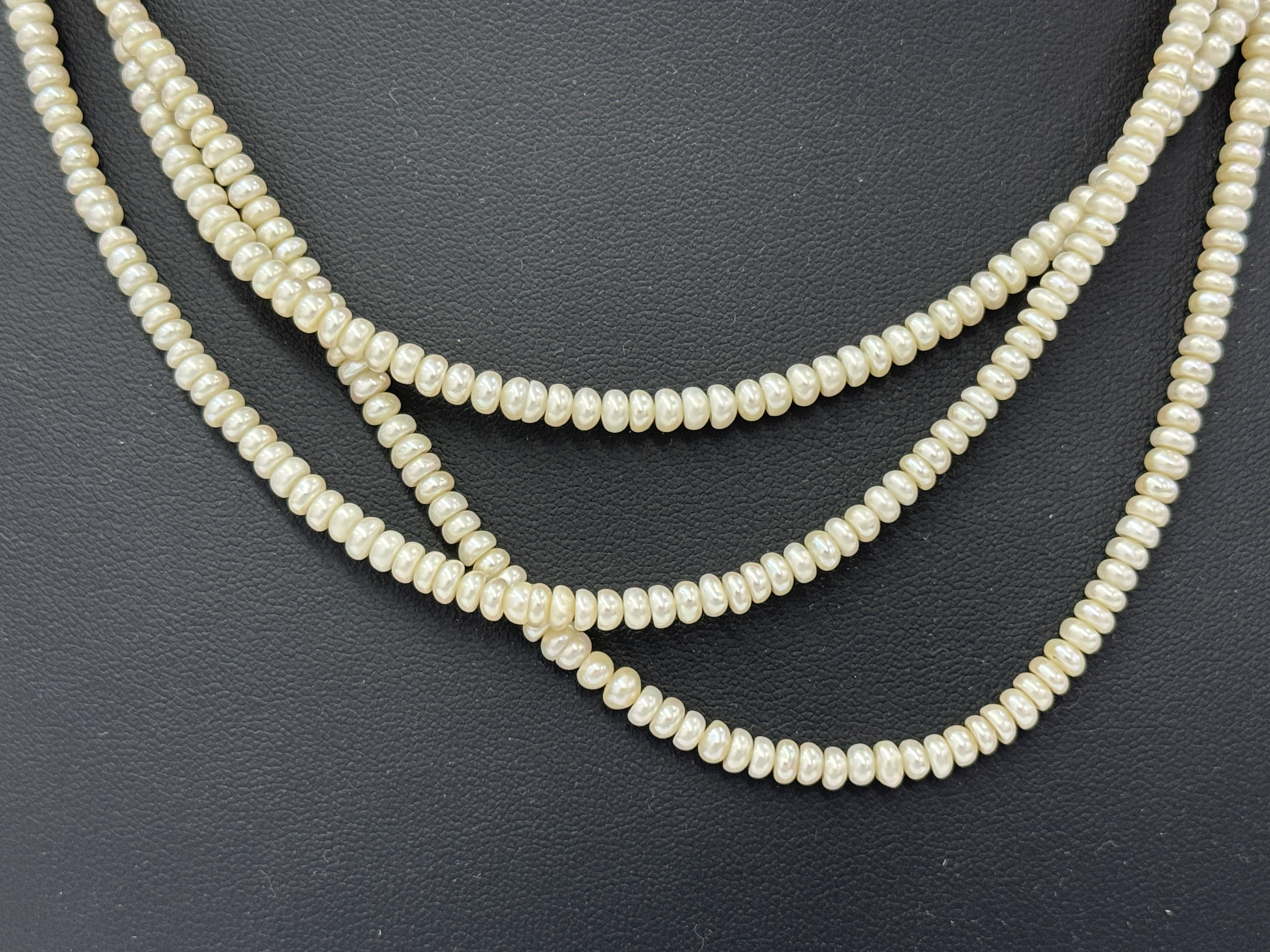 Triple Strand Semi-Round Pearl Necklace with Silver Floral Clasp