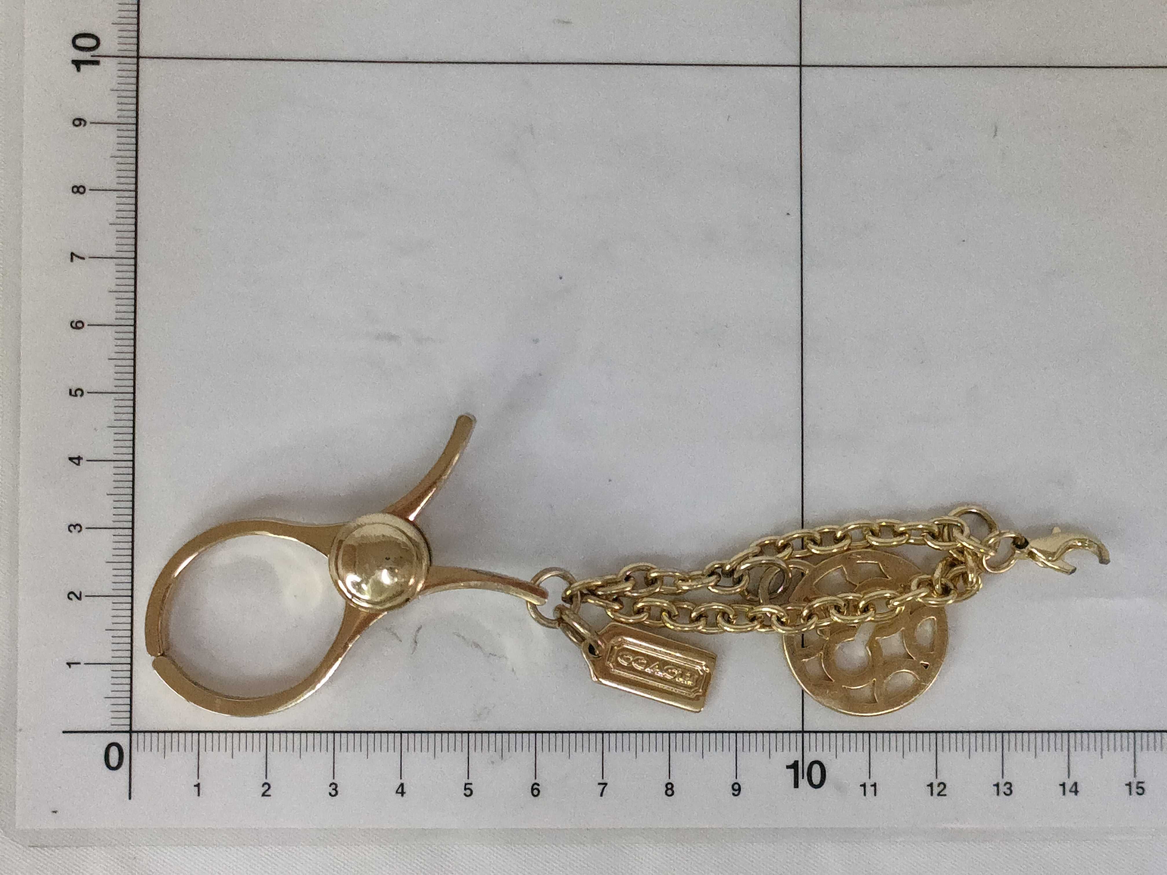Coach Gold-Tone Glove Holder and Bag Charm with Box