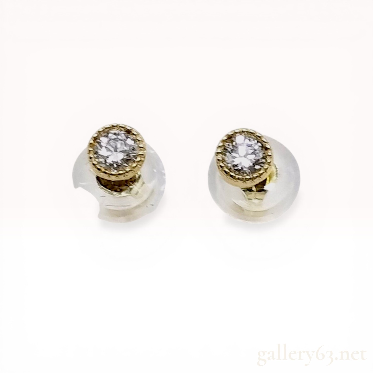 A Pair of Diamond and 18K Yellow Gold Stud Earrings