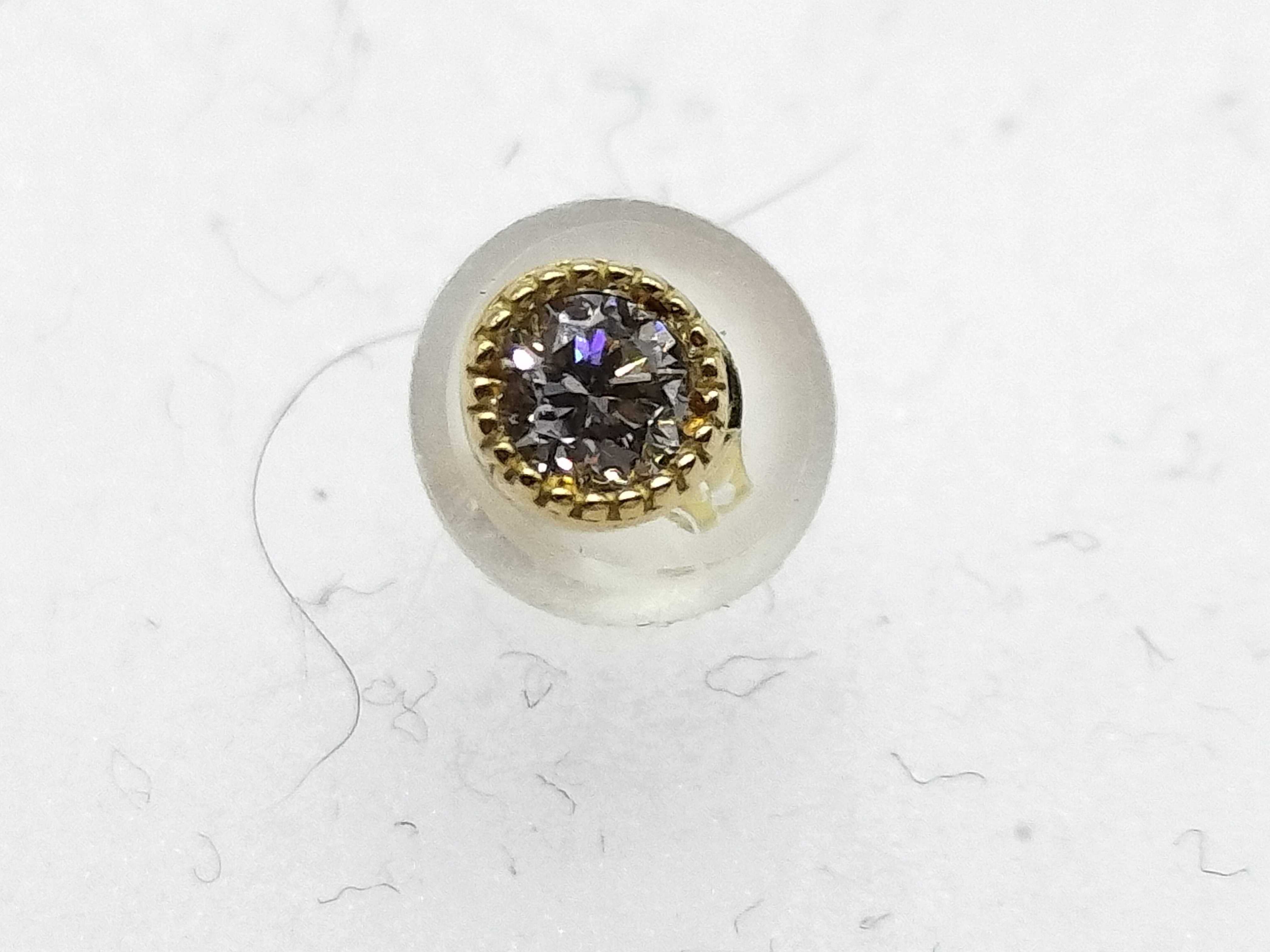 A Pair of Diamond and 18K Yellow Gold Stud Earrings
