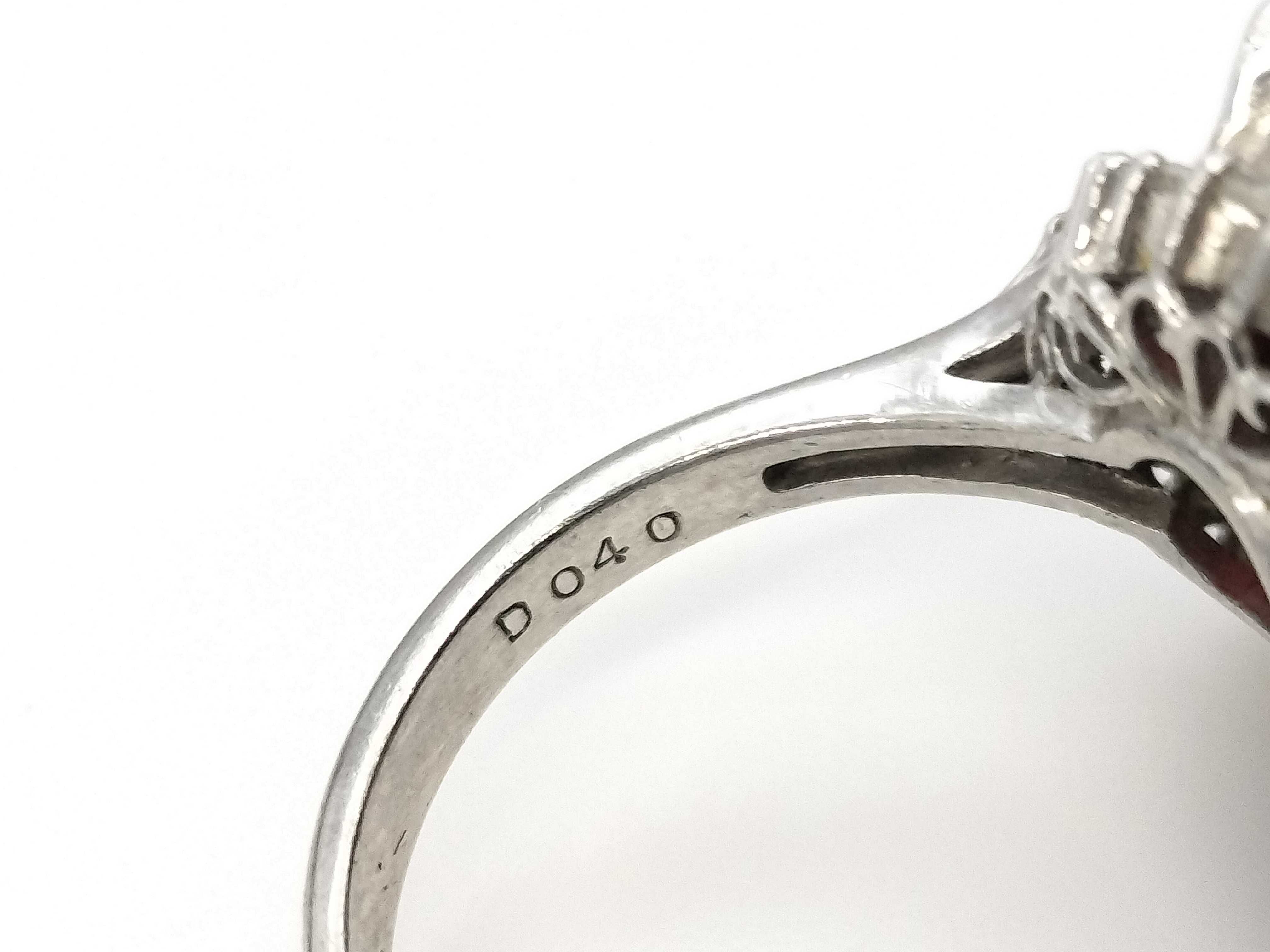 Platinum, Garnet and Diamond Halo Cocktail Ring
