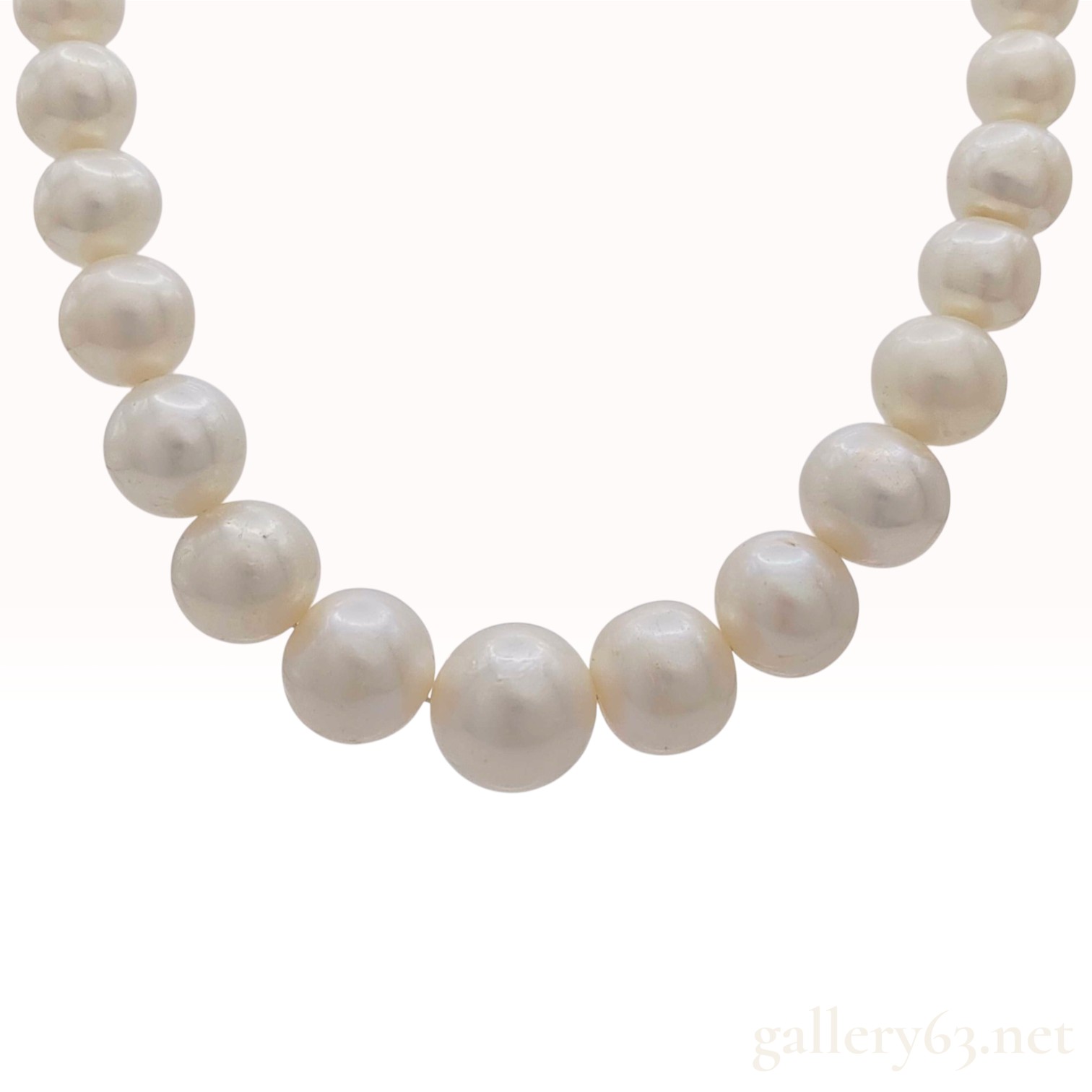 Graduated White Cultured Pearl Strand Necklace with Silver Floral Clasp
