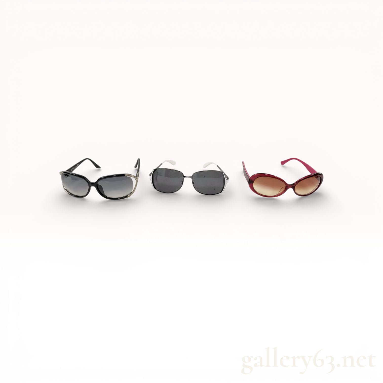 Three Pairs of Sunglasses including Examples by Christian Dior and Coach