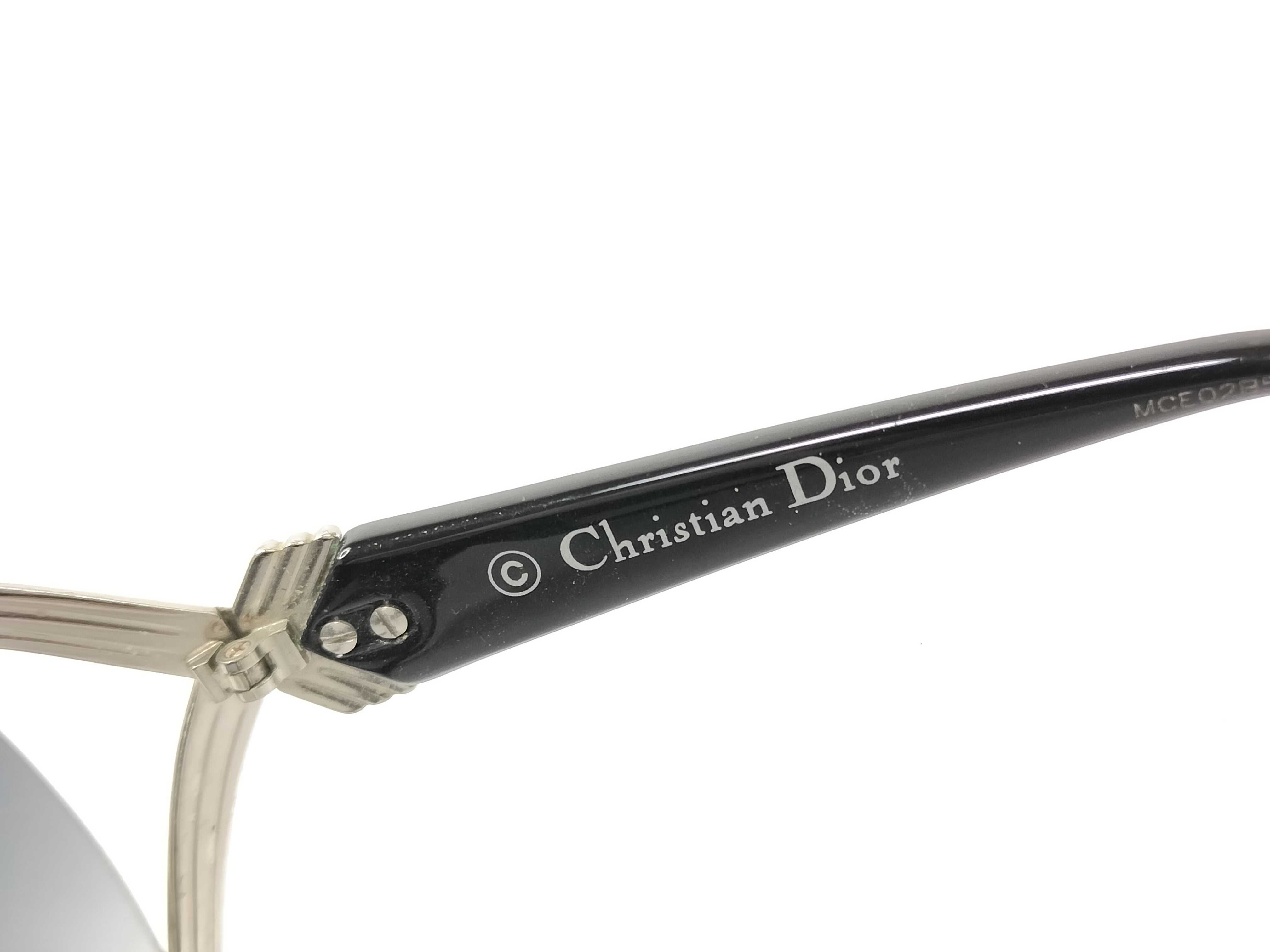 Three Pairs of Sunglasses including Examples by Christian Dior and Coach