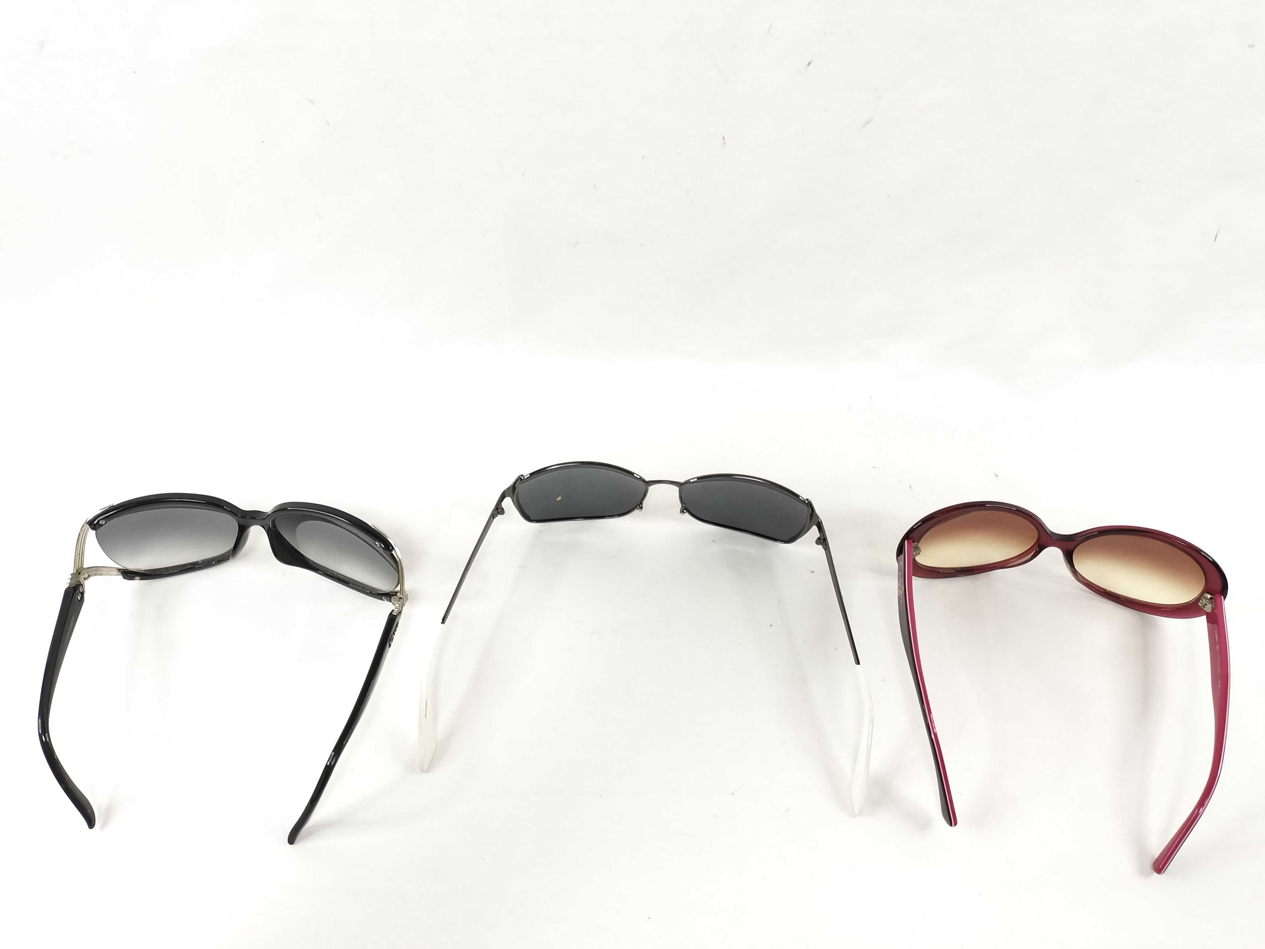 Three Pairs of Sunglasses including Examples by Christian Dior and Coach