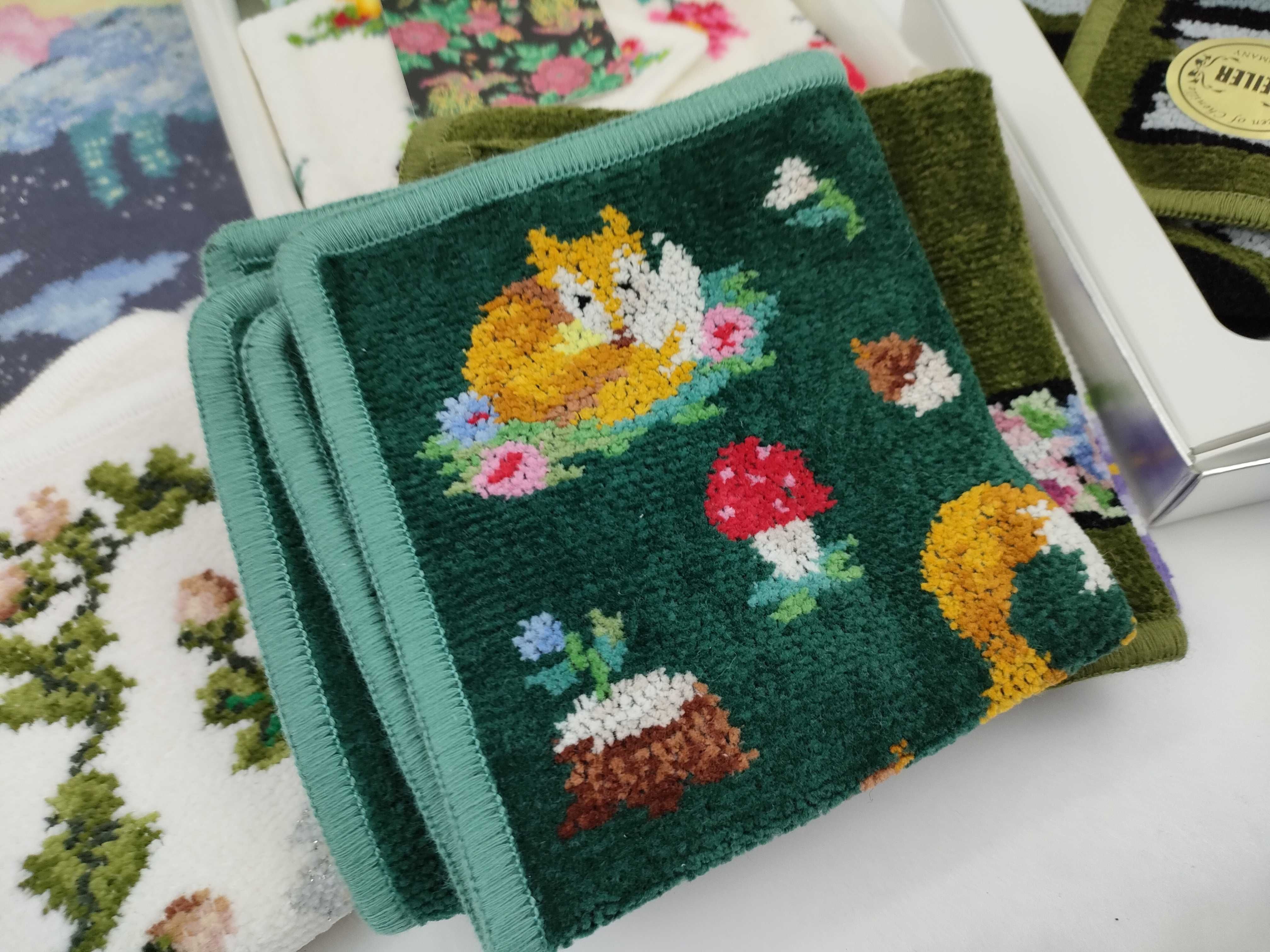 A Collection of Feiler German Chenille Hand Towels and Pocket Squares