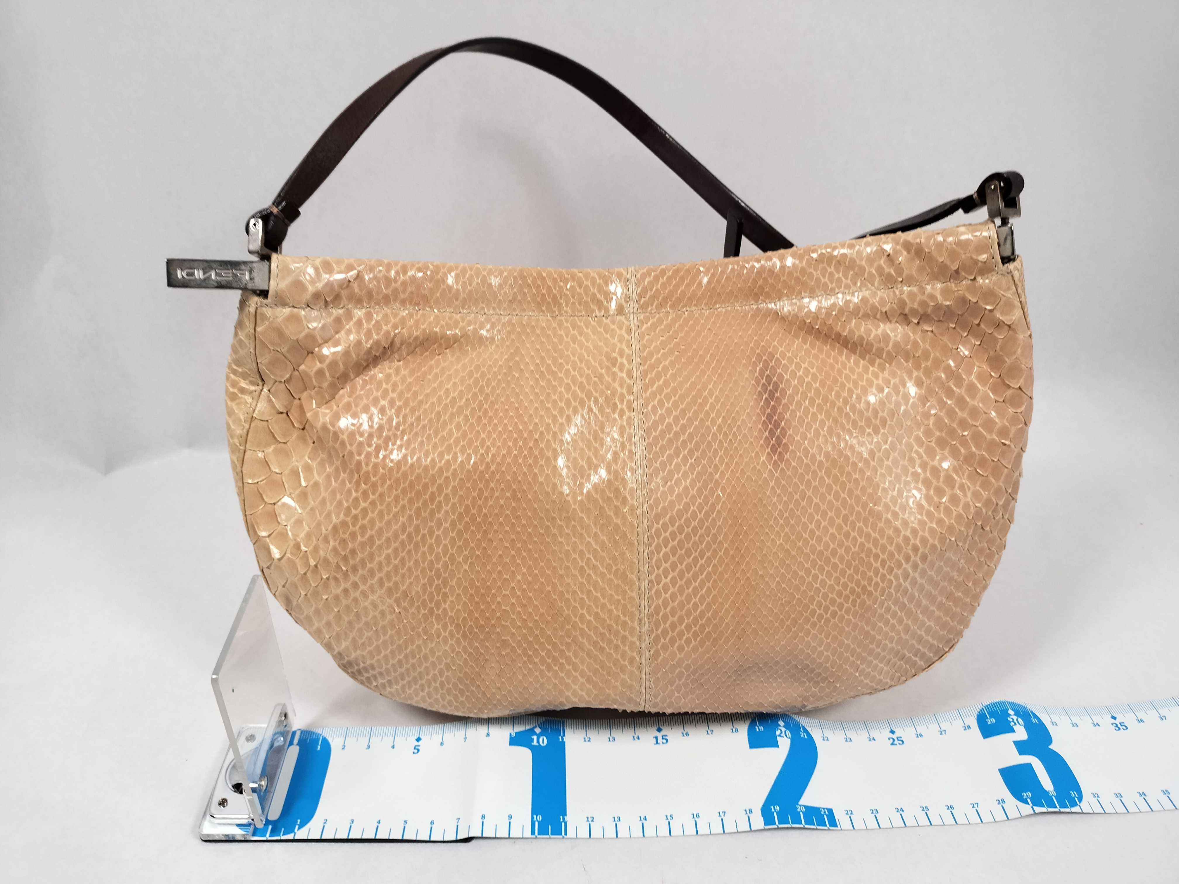 An Exotic Fendi Peach Snakeskin Crescent Shoulder Bag