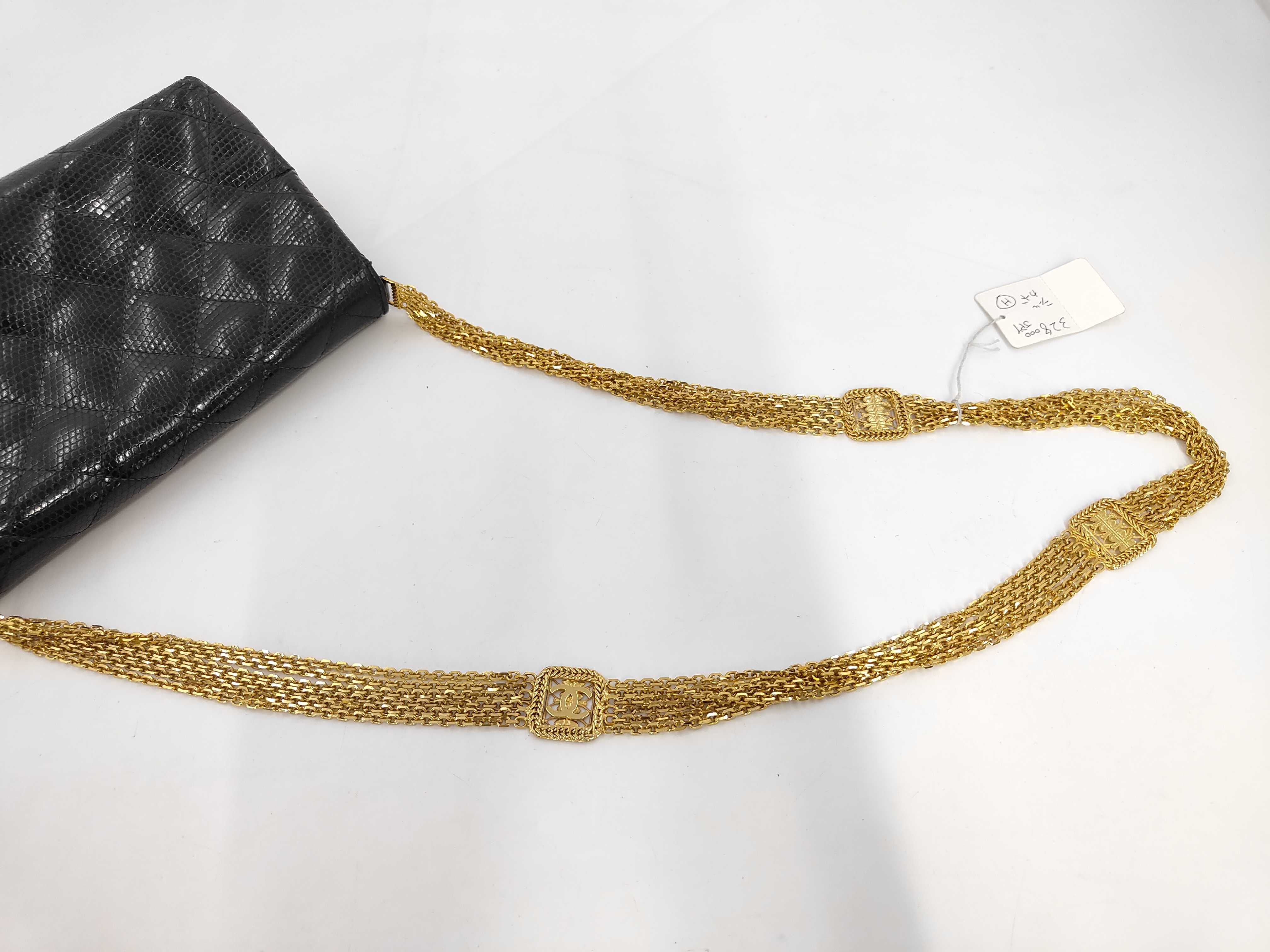 An Important Chanel Vintage Black Quilted Lizard Skin Flap Bag with Multi-Strand Gold-Plated Chain, 0 Series 1984-1986