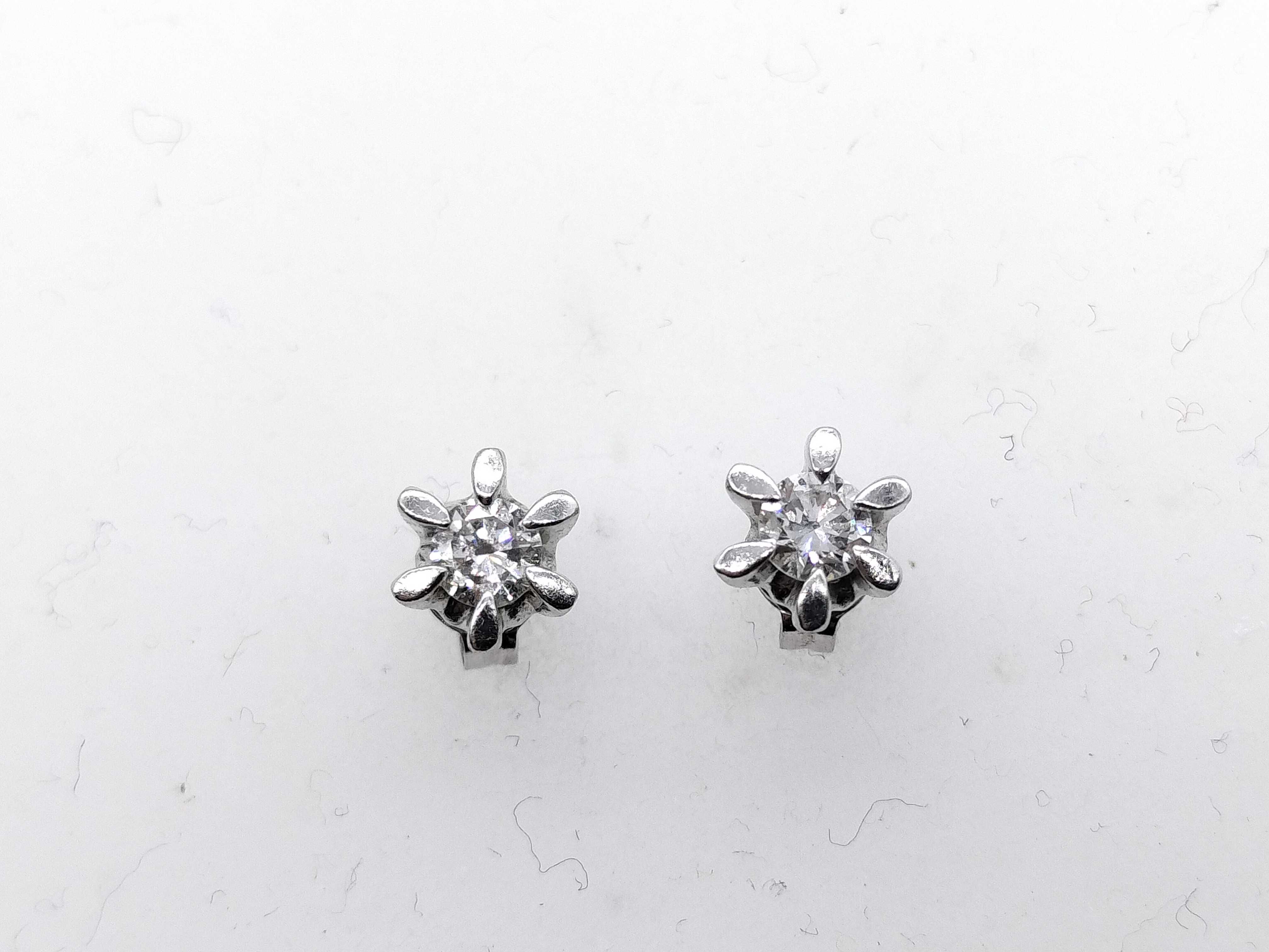 A Pair of Diamond and Platinum Flower Style Stud Earrings