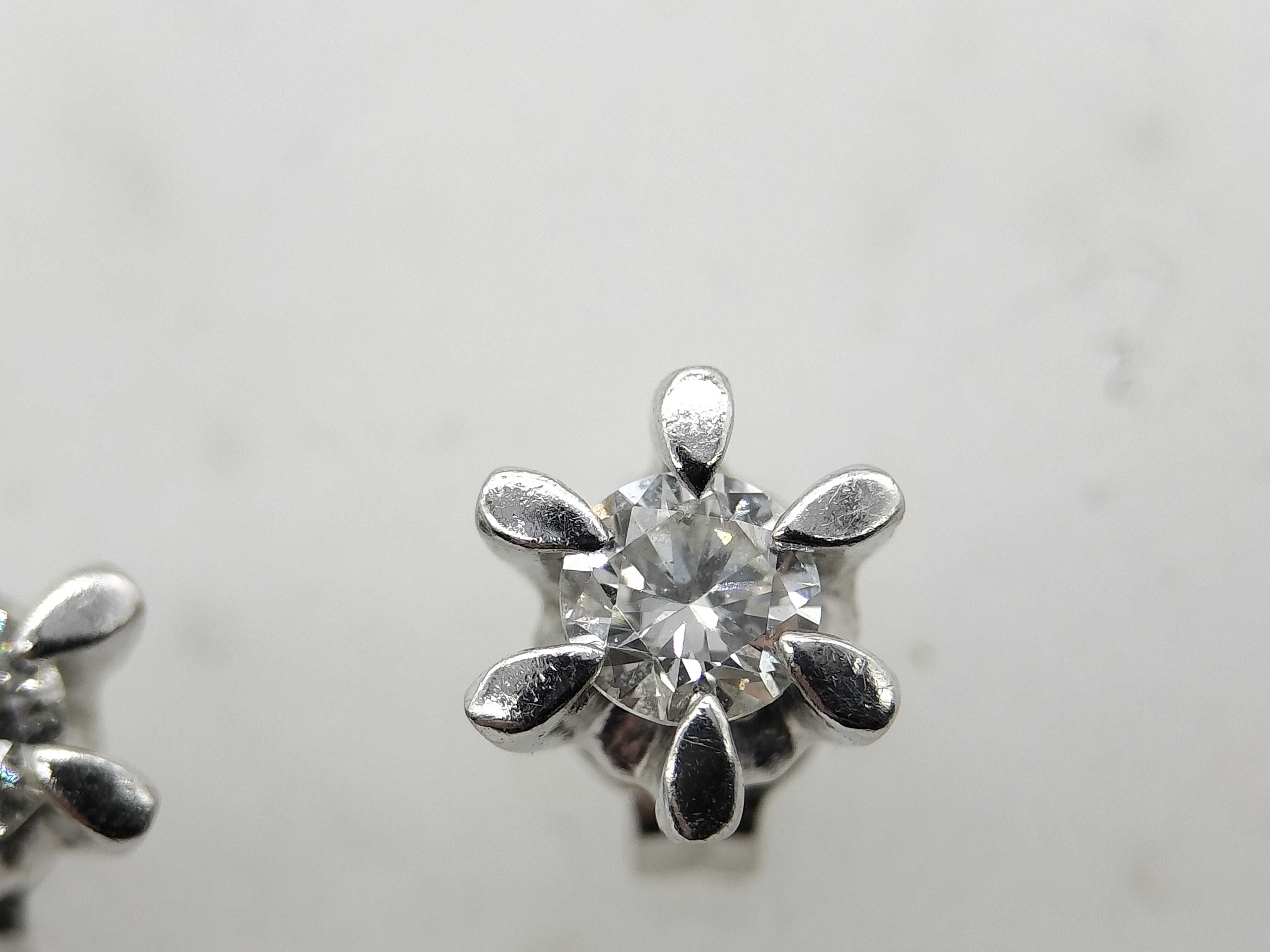 A Pair of Diamond and Platinum Flower Style Stud Earrings
