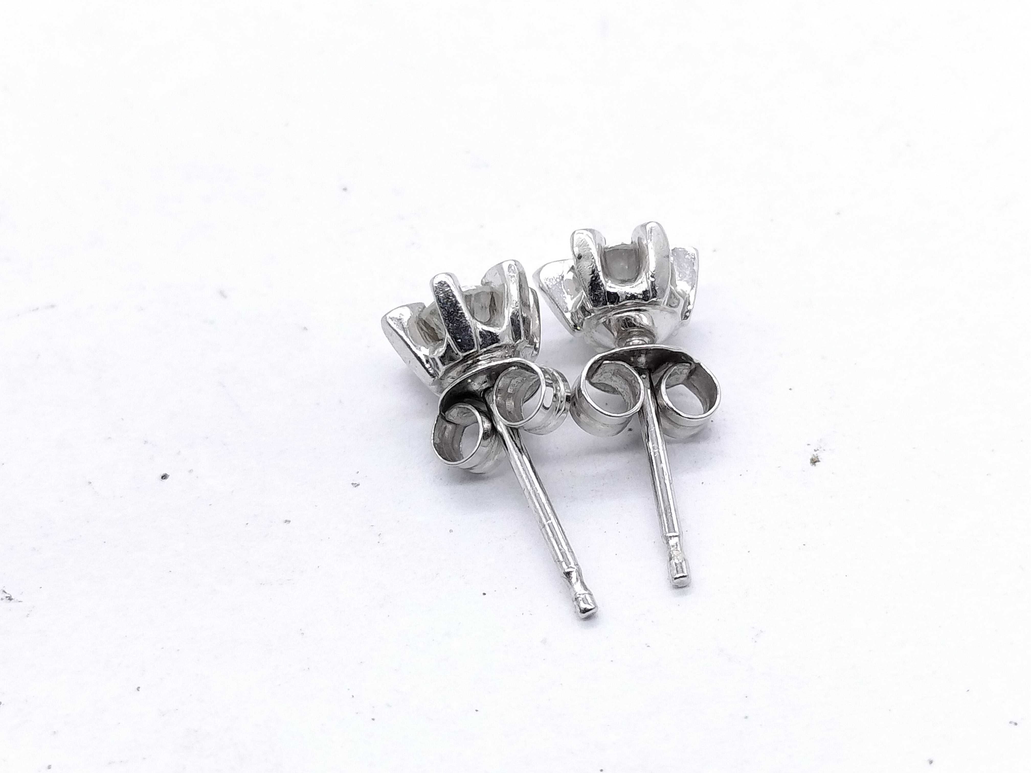 A Pair of Diamond and Platinum Flower Style Stud Earrings