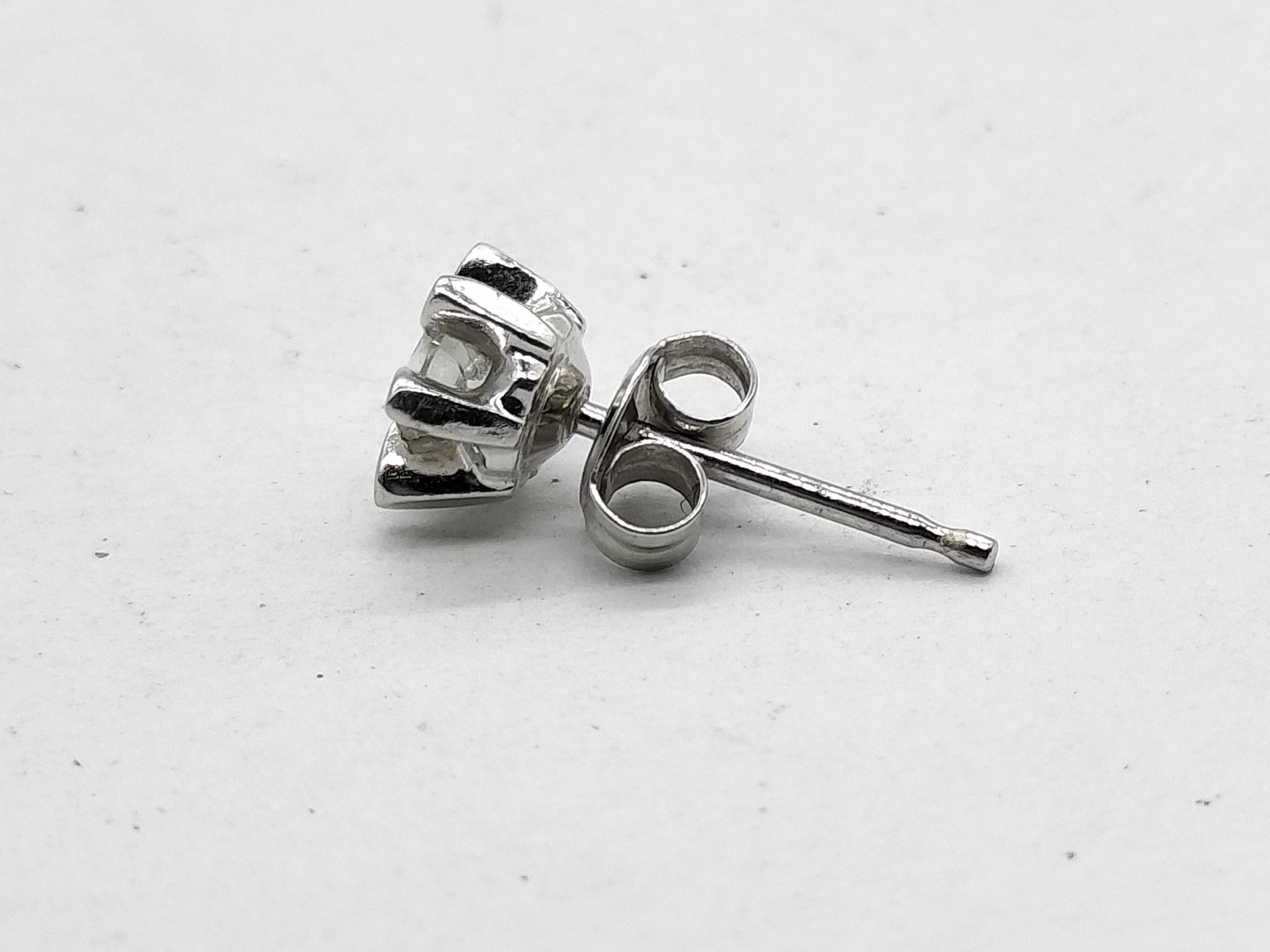 A Pair of Diamond and Platinum Flower Style Stud Earrings