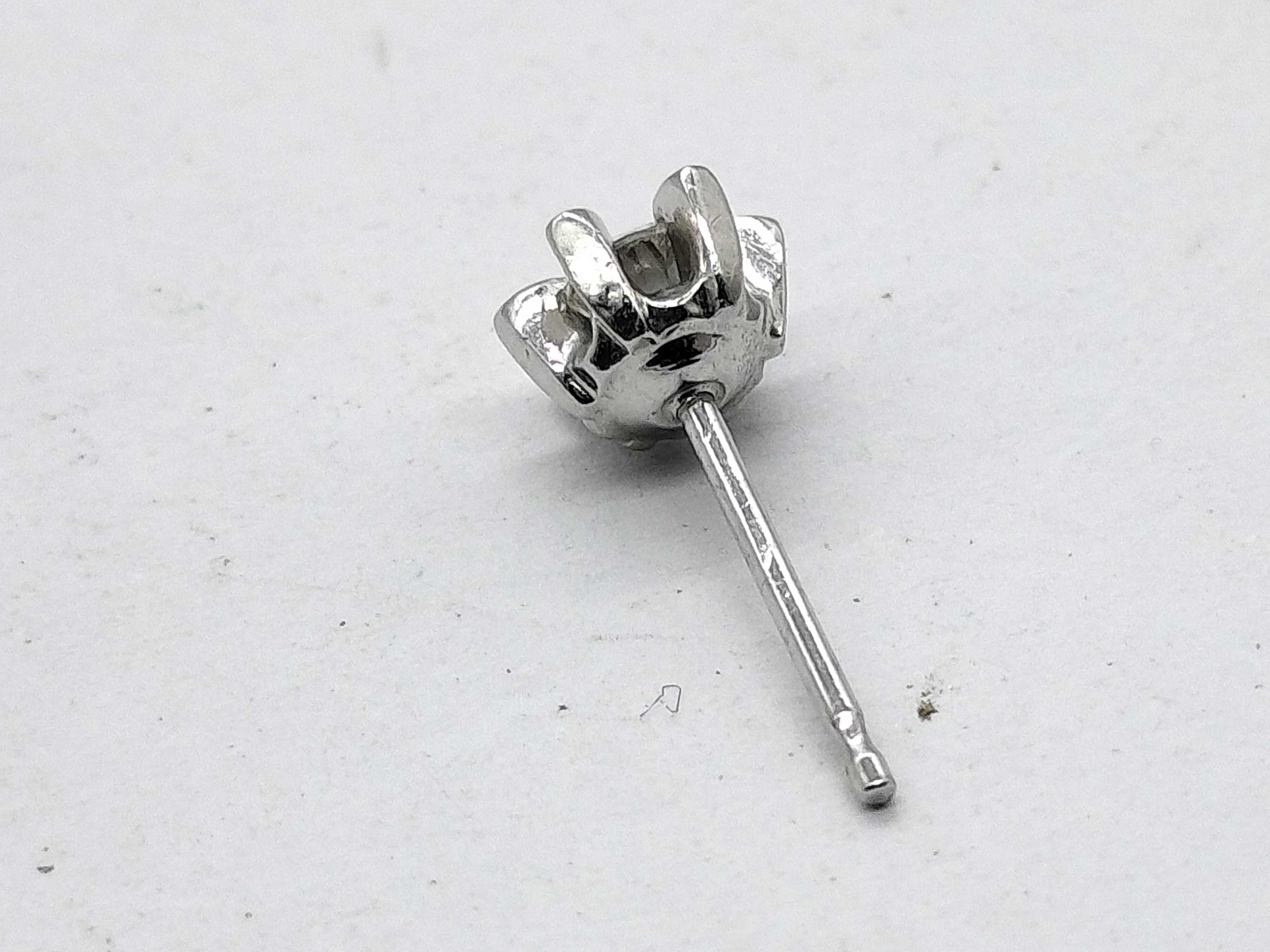 A Pair of Diamond and Platinum Flower Style Stud Earrings
