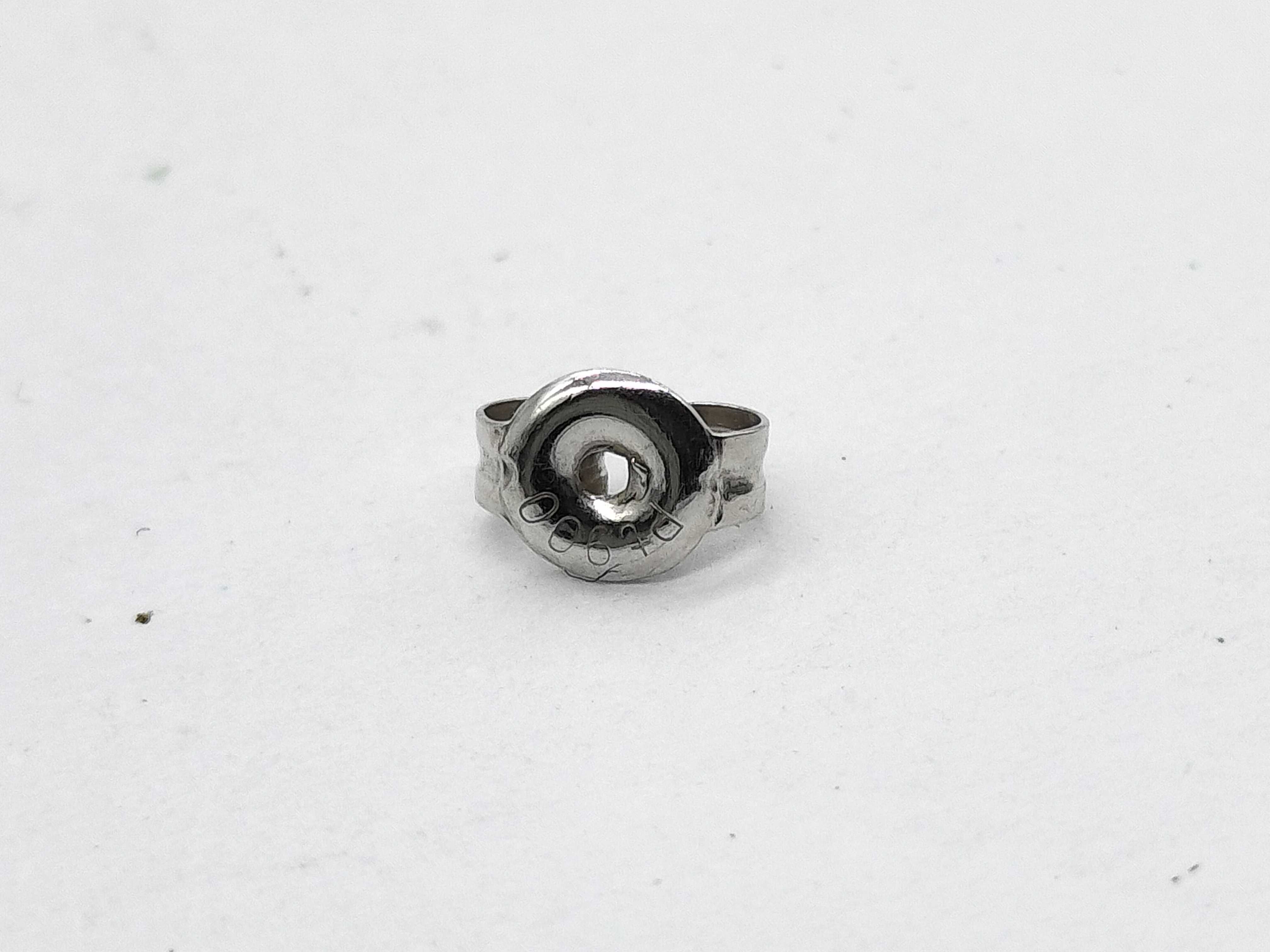 A Pair of Diamond and Platinum Flower Style Stud Earrings