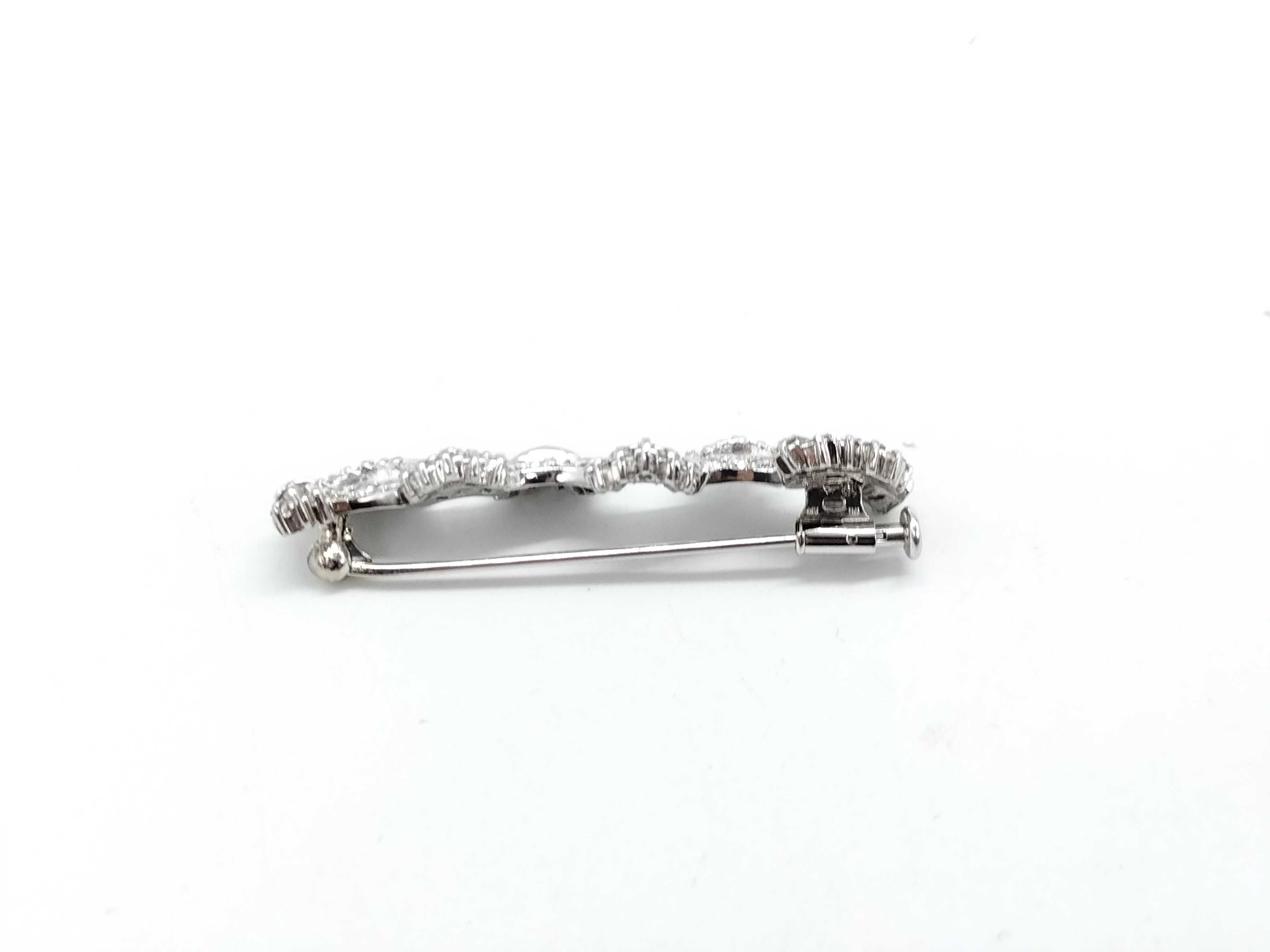 14 Karat White Gold and Diamond Wavy Ribbon Spray Brooch