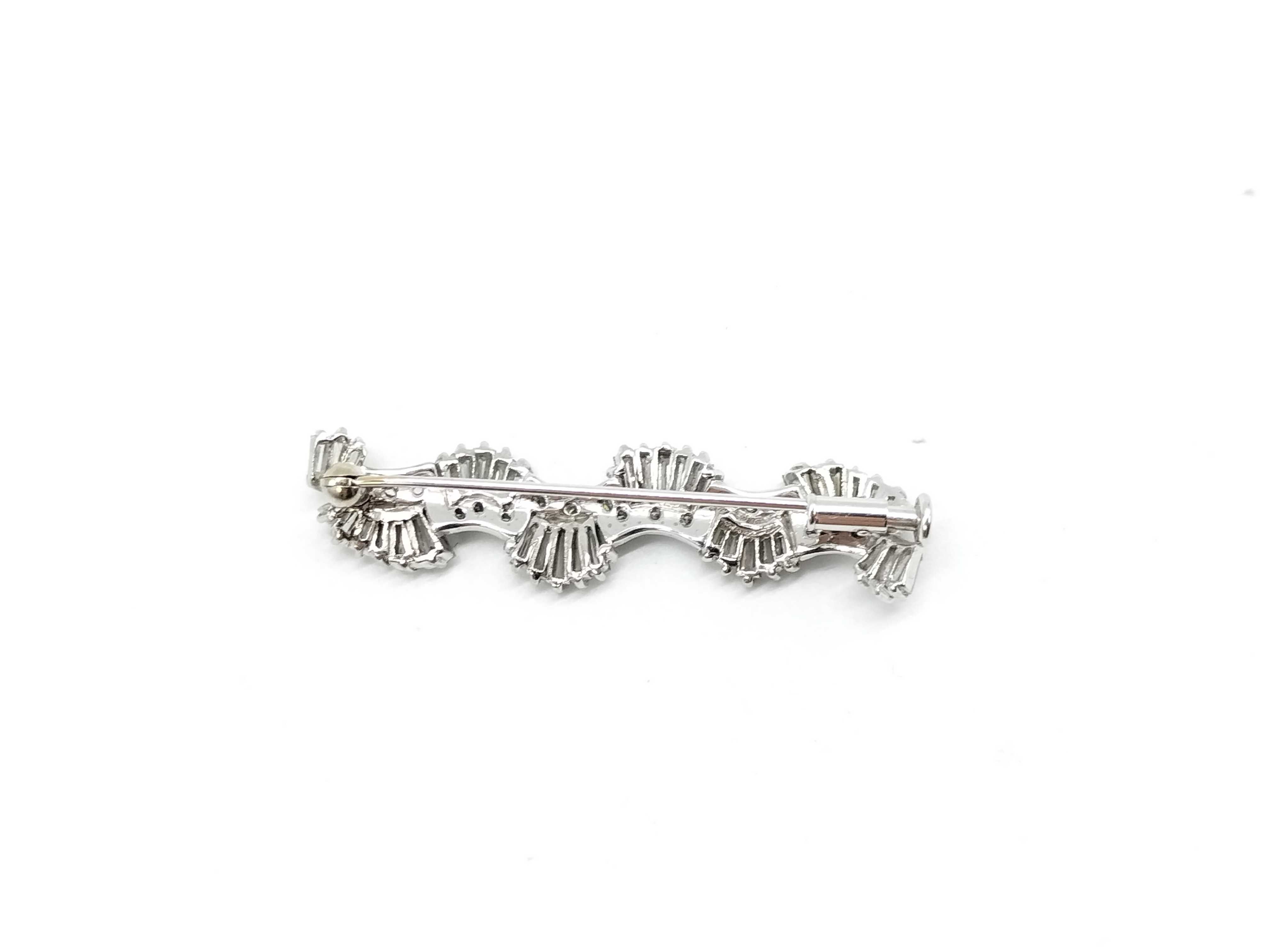 14 Karat White Gold and Diamond Wavy Ribbon Spray Brooch
