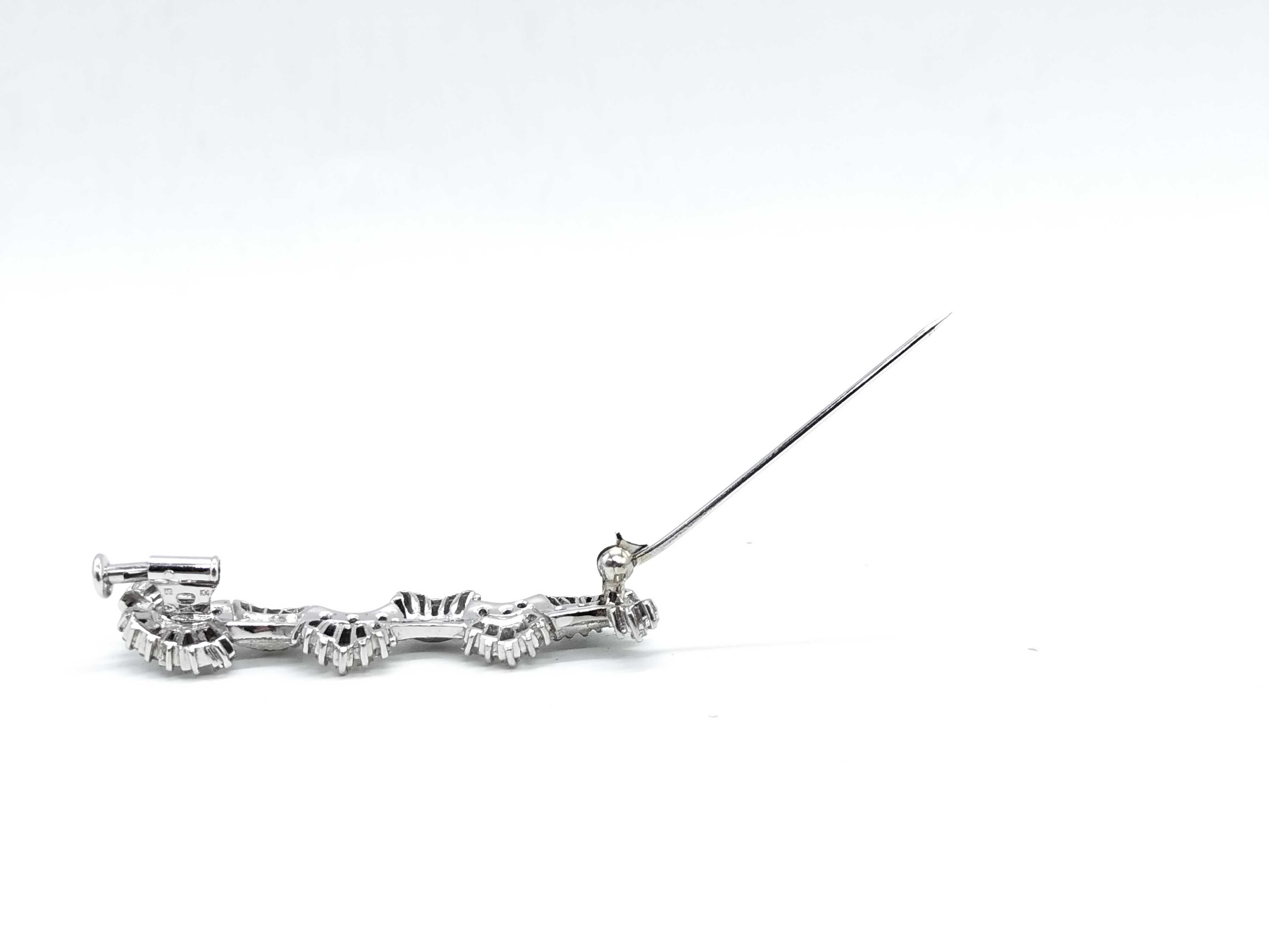 14 Karat White Gold and Diamond Wavy Ribbon Spray Brooch