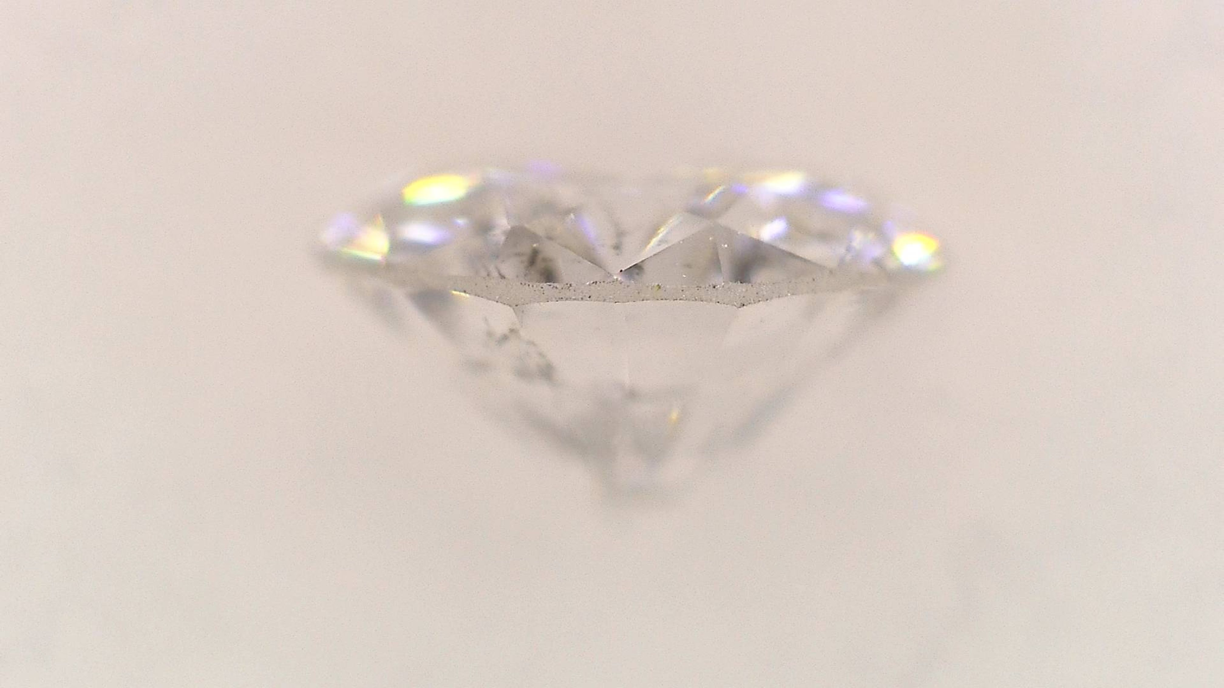 0.248 Carat E-SI2 Round Brilliant Cut Natural Diamond with Central Gem Laboratory Report