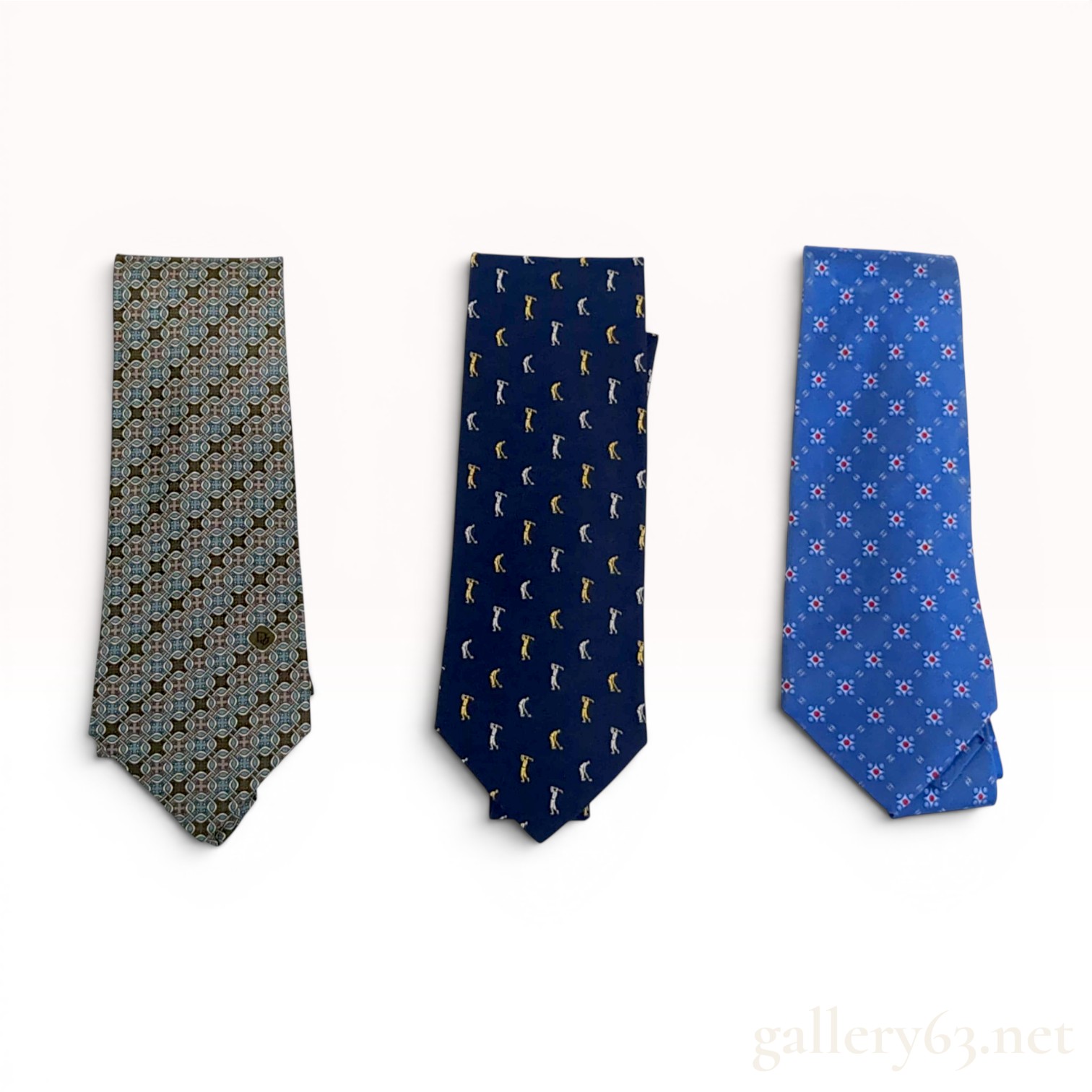 A Trio of Designer Silk Neckties including Christian Dior, Alfred Dunhill, and Chanel