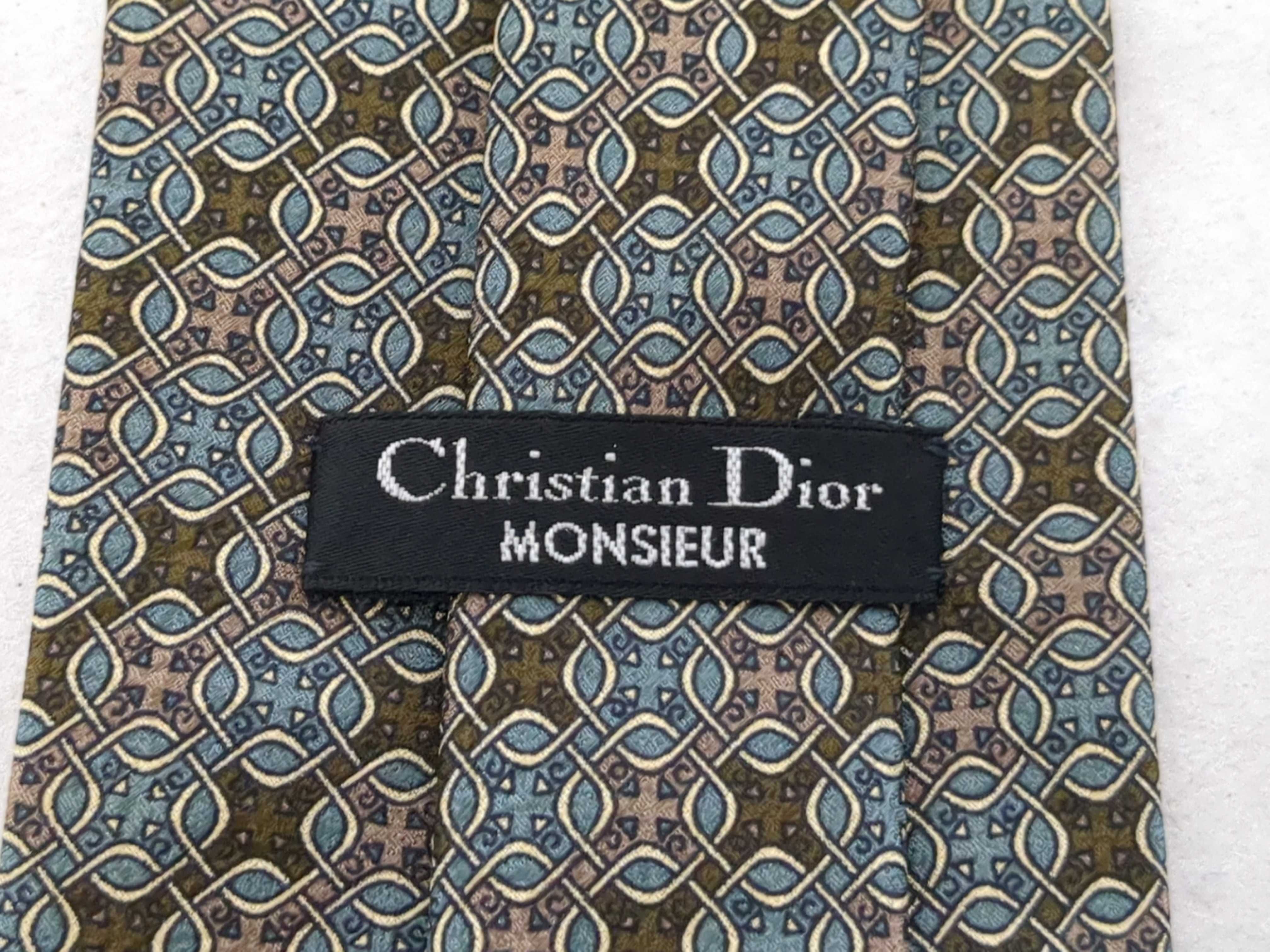 A Trio of Designer Silk Neckties including Christian Dior, Alfred Dunhill, and Chanel