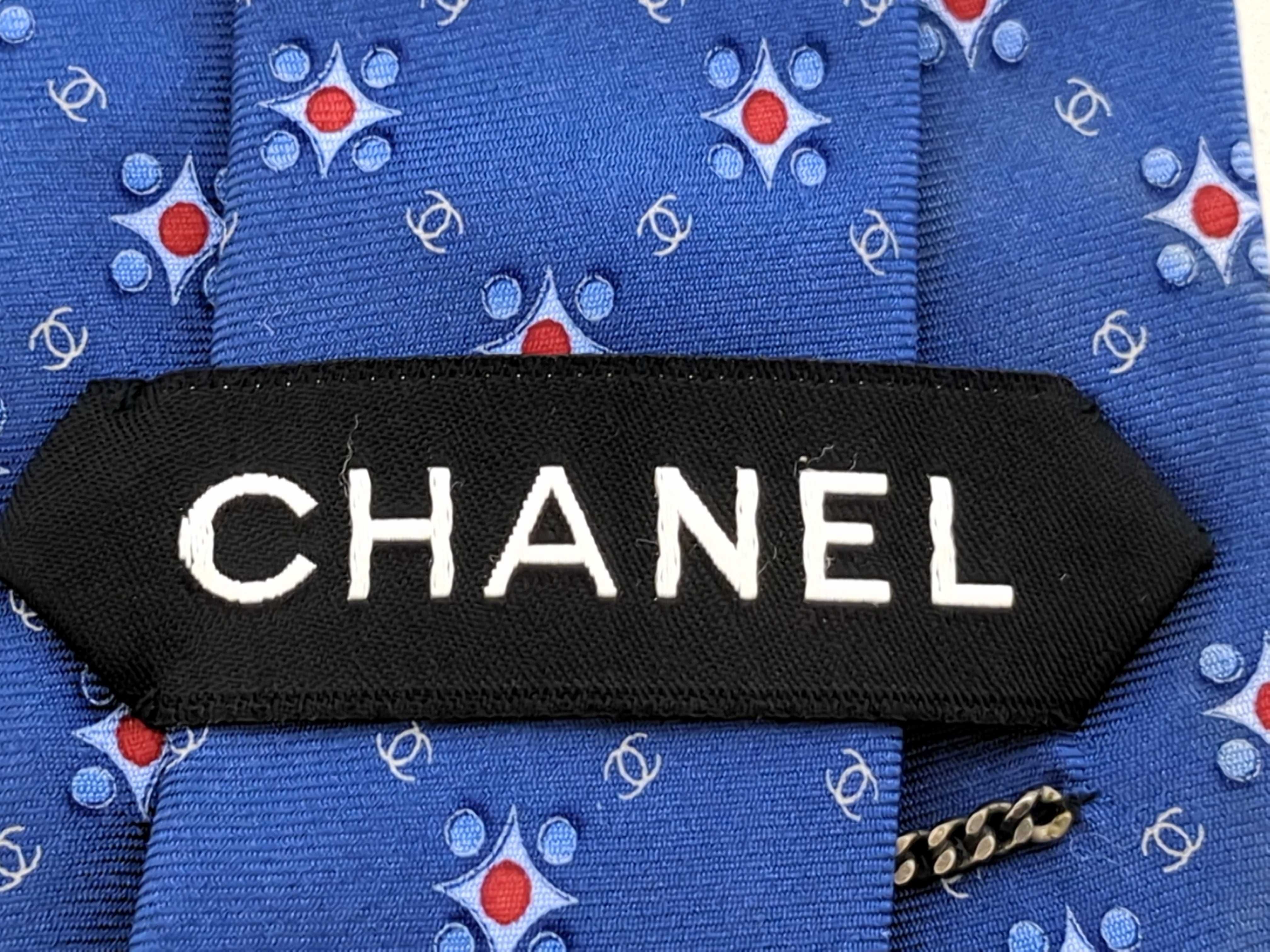 A Trio of Designer Silk Neckties including Christian Dior, Alfred Dunhill, and Chanel