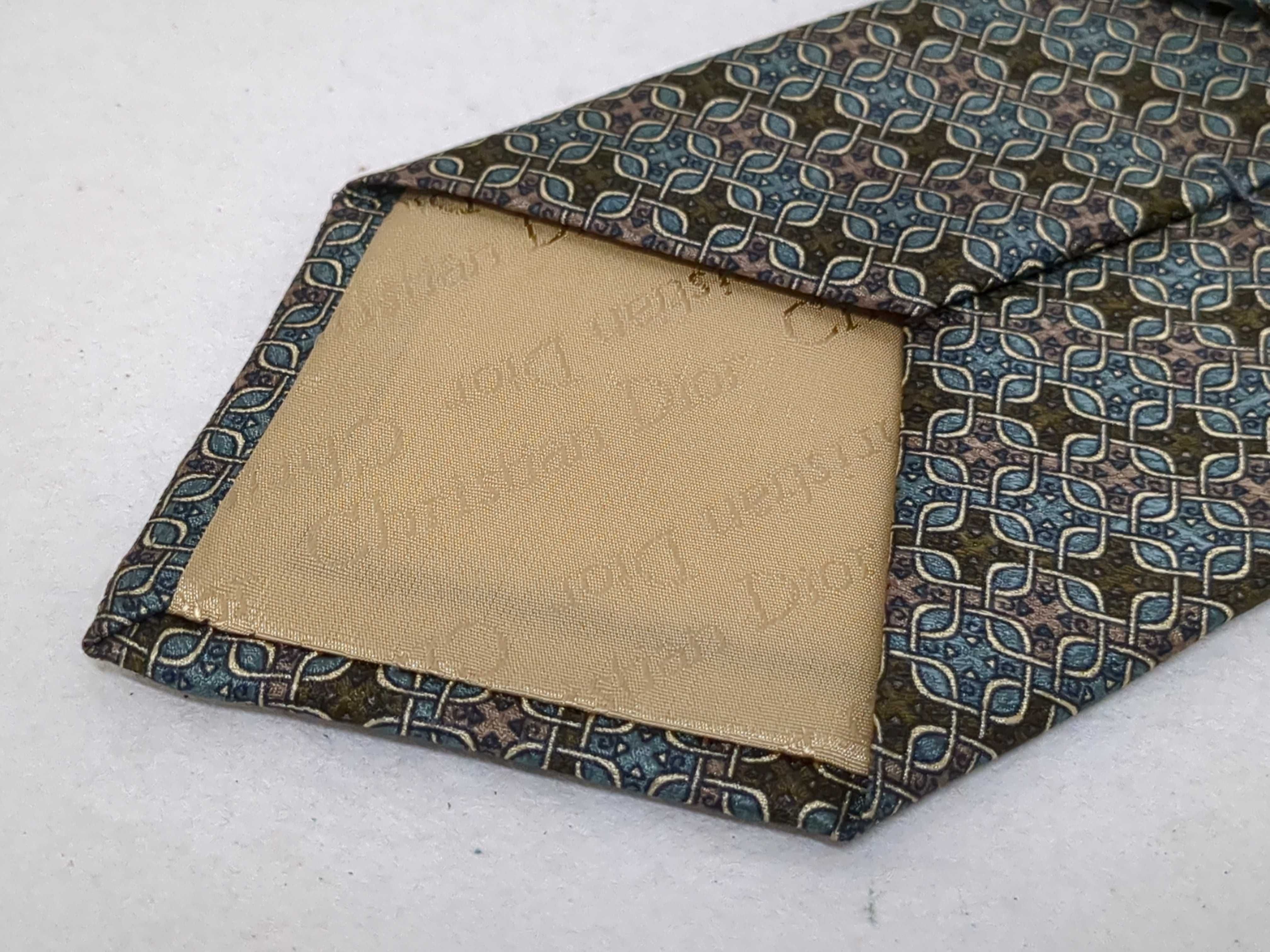 A Trio of Designer Silk Neckties including Christian Dior, Alfred Dunhill, and Chanel
