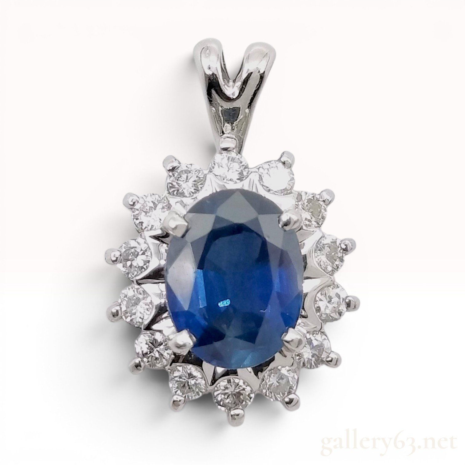 Platinum Sapphire and Diamond Halo Pendant