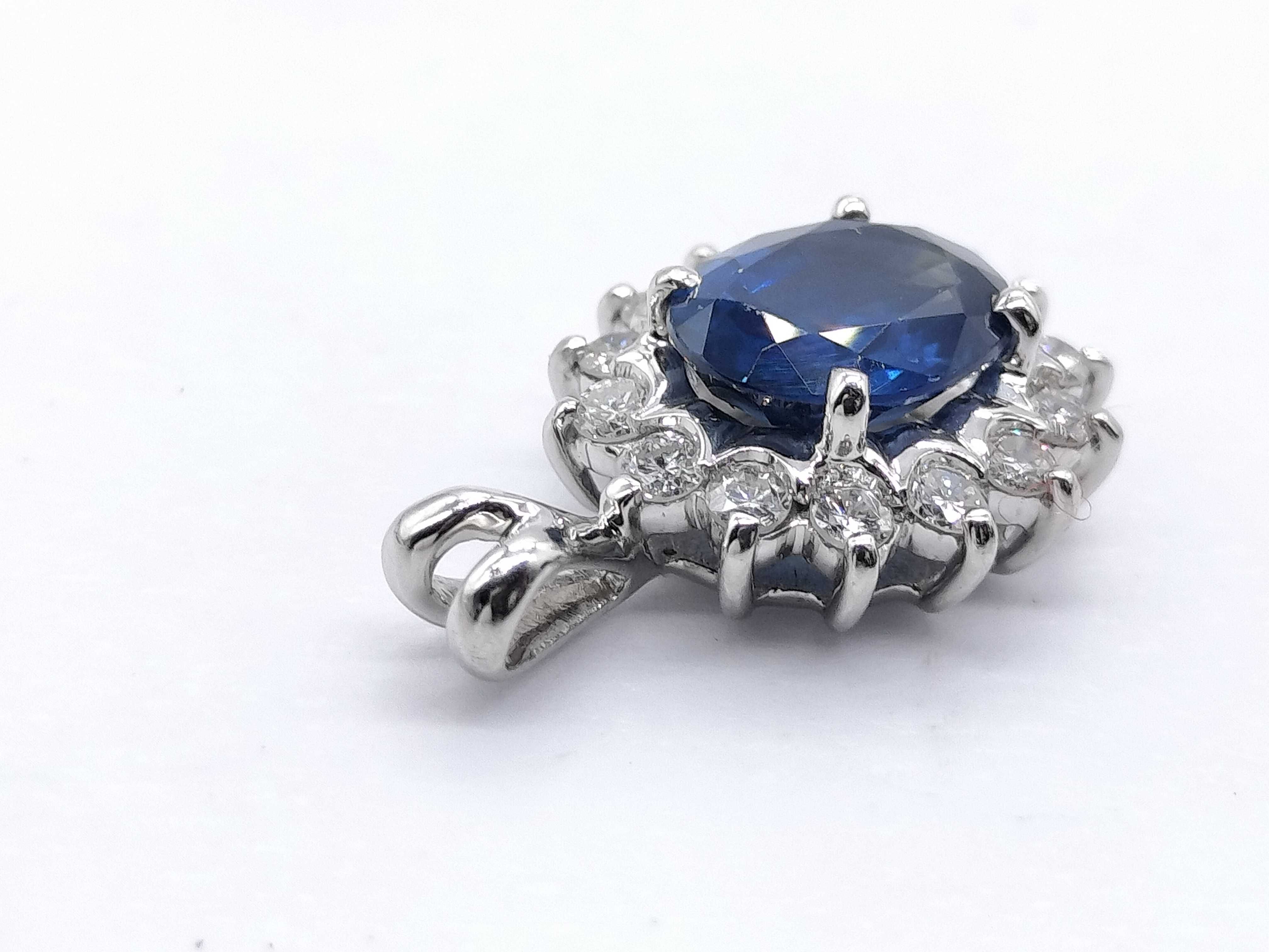 Platinum Sapphire and Diamond Halo Pendant