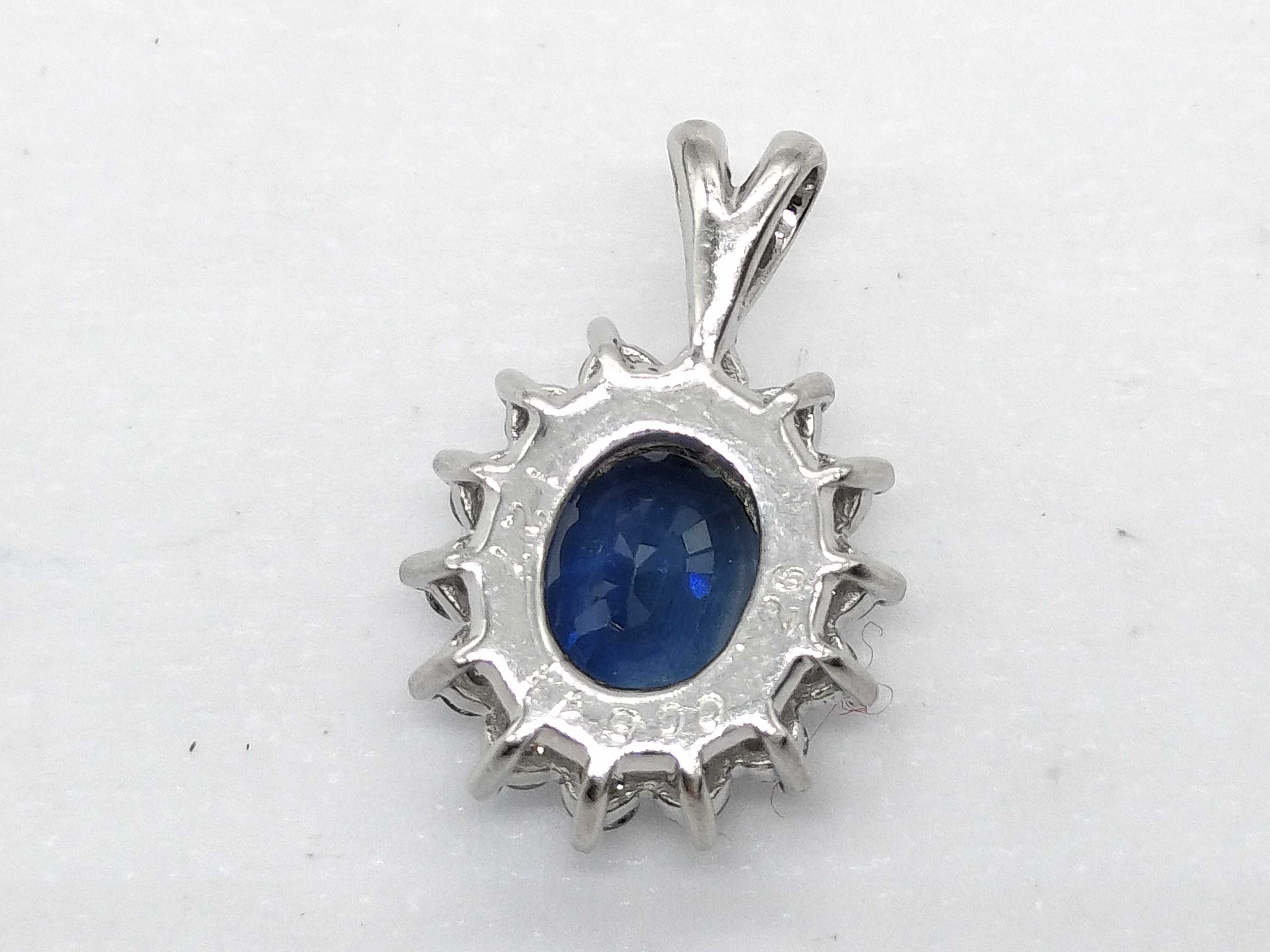 Platinum Sapphire and Diamond Halo Pendant