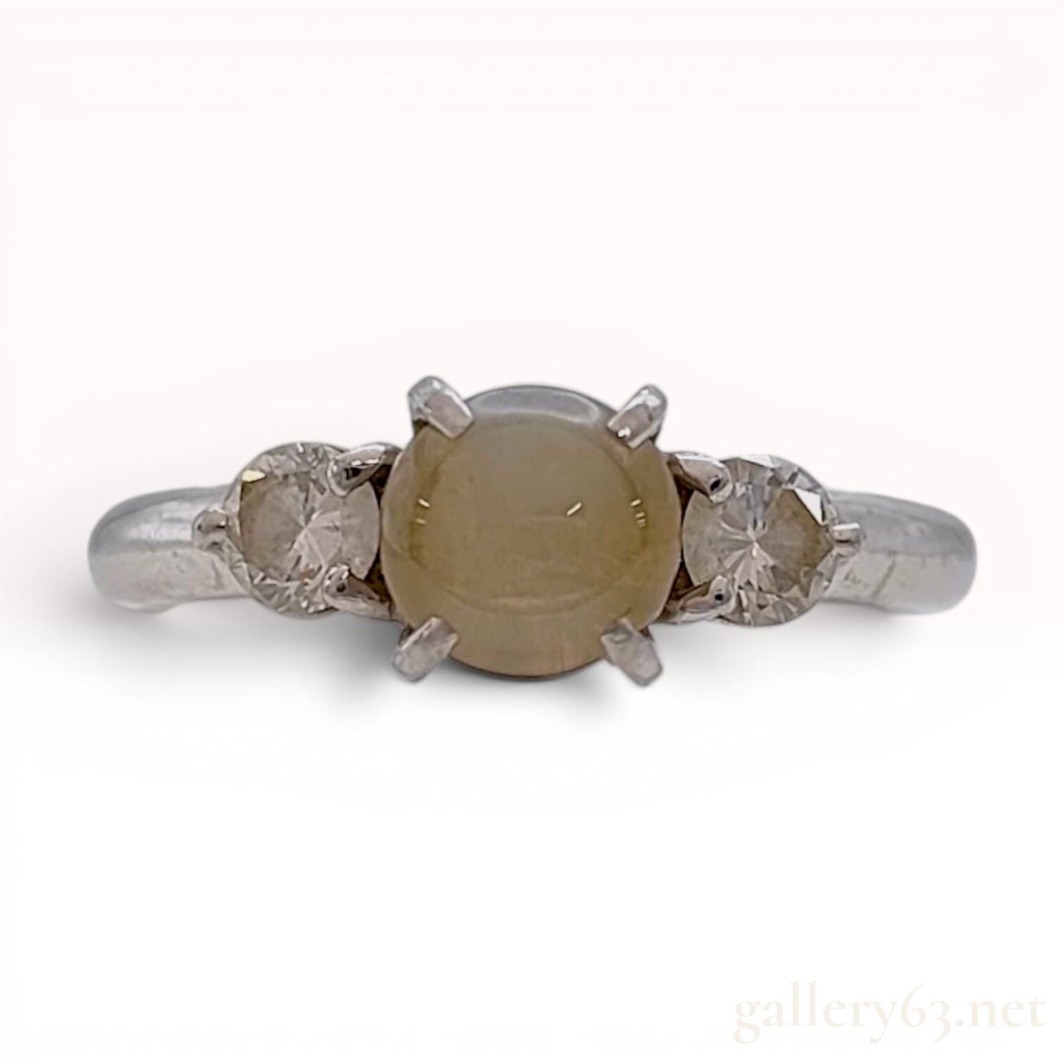 Platinum Chrysoberyl Cat's-Eye and Diamond Three-Stone Ring