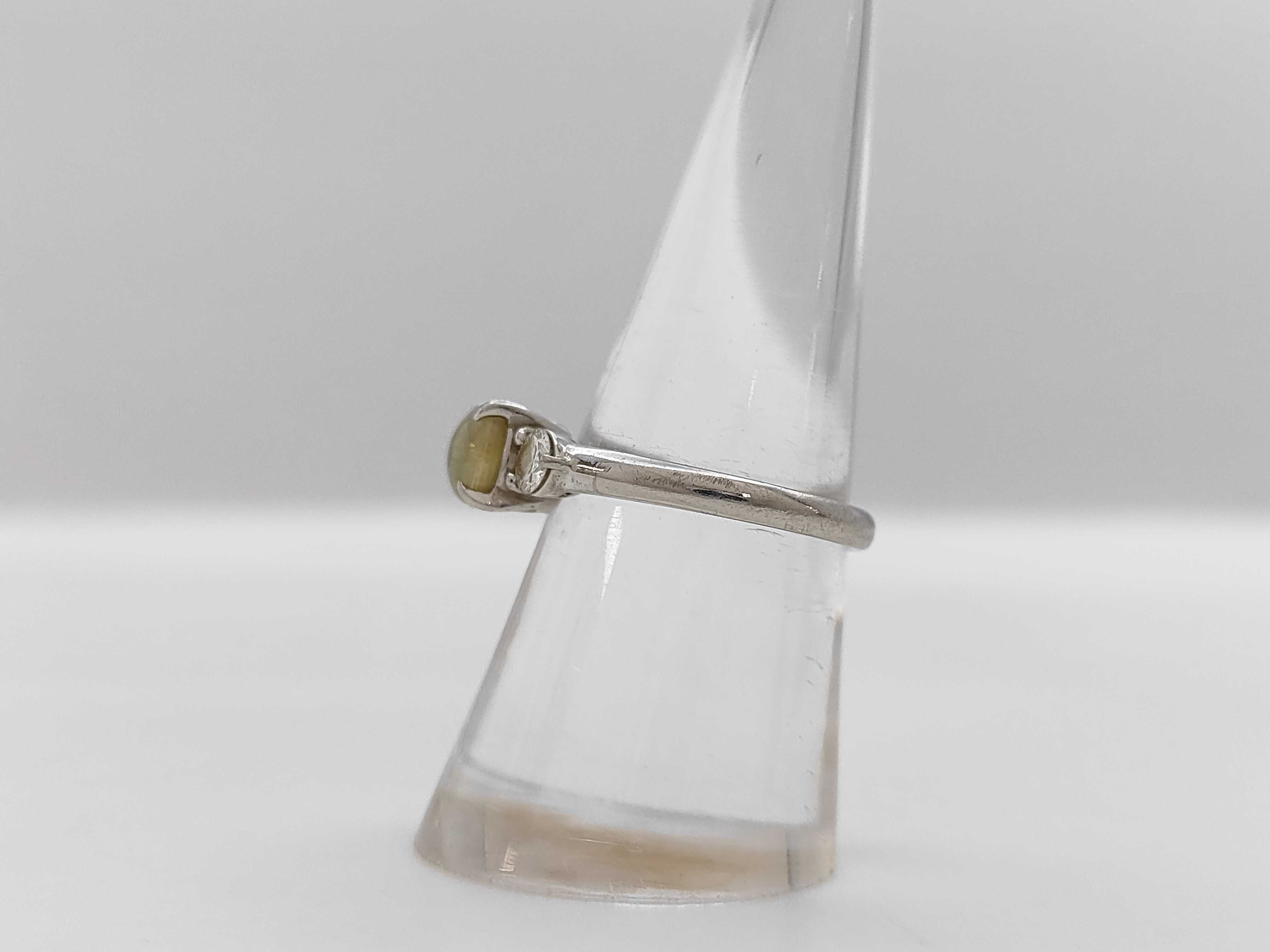 Platinum Chrysoberyl Cat's-Eye and Diamond Three-Stone Ring