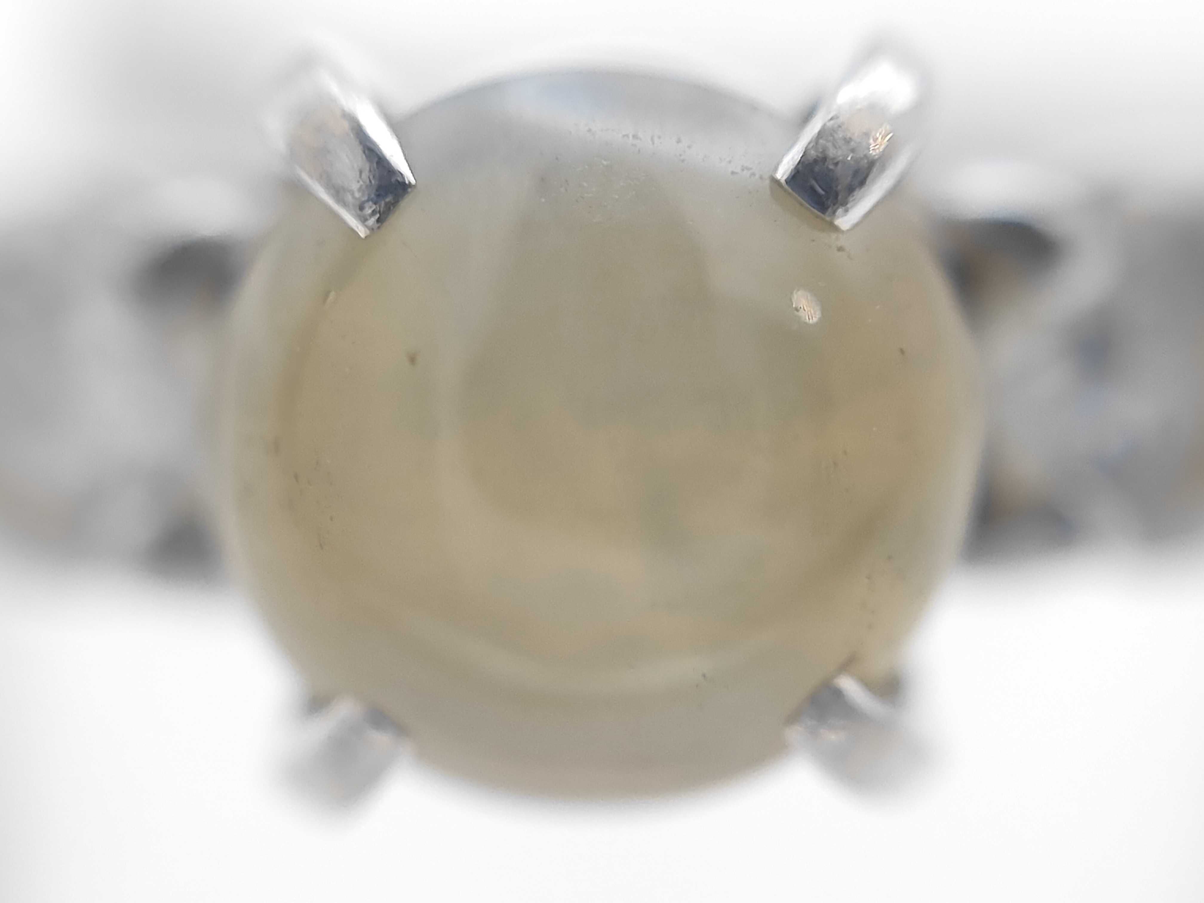 Platinum Chrysoberyl Cat's-Eye and Diamond Three-Stone Ring