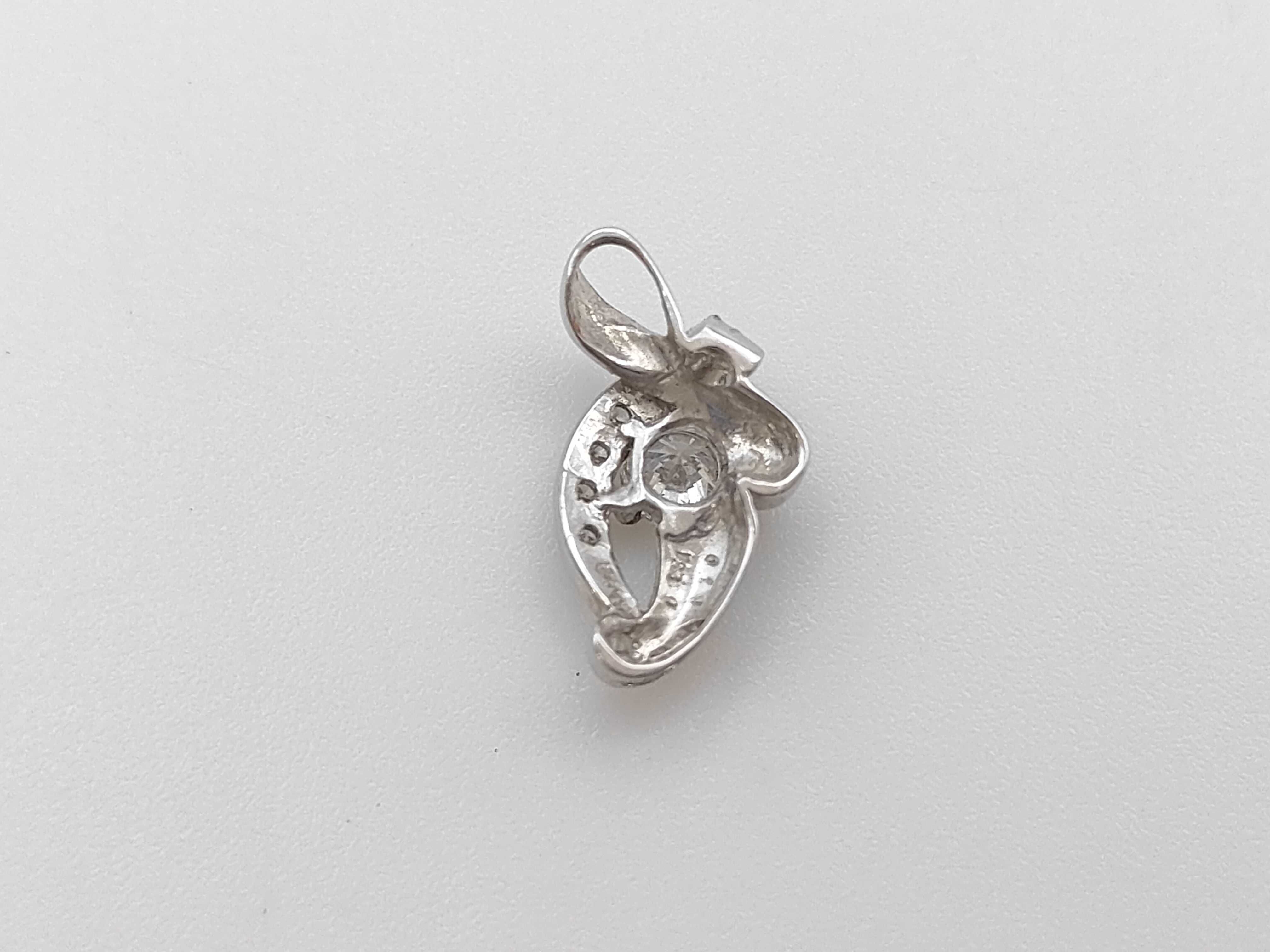Platinum and Diamond Bypass Pendant with CGL Grading Report