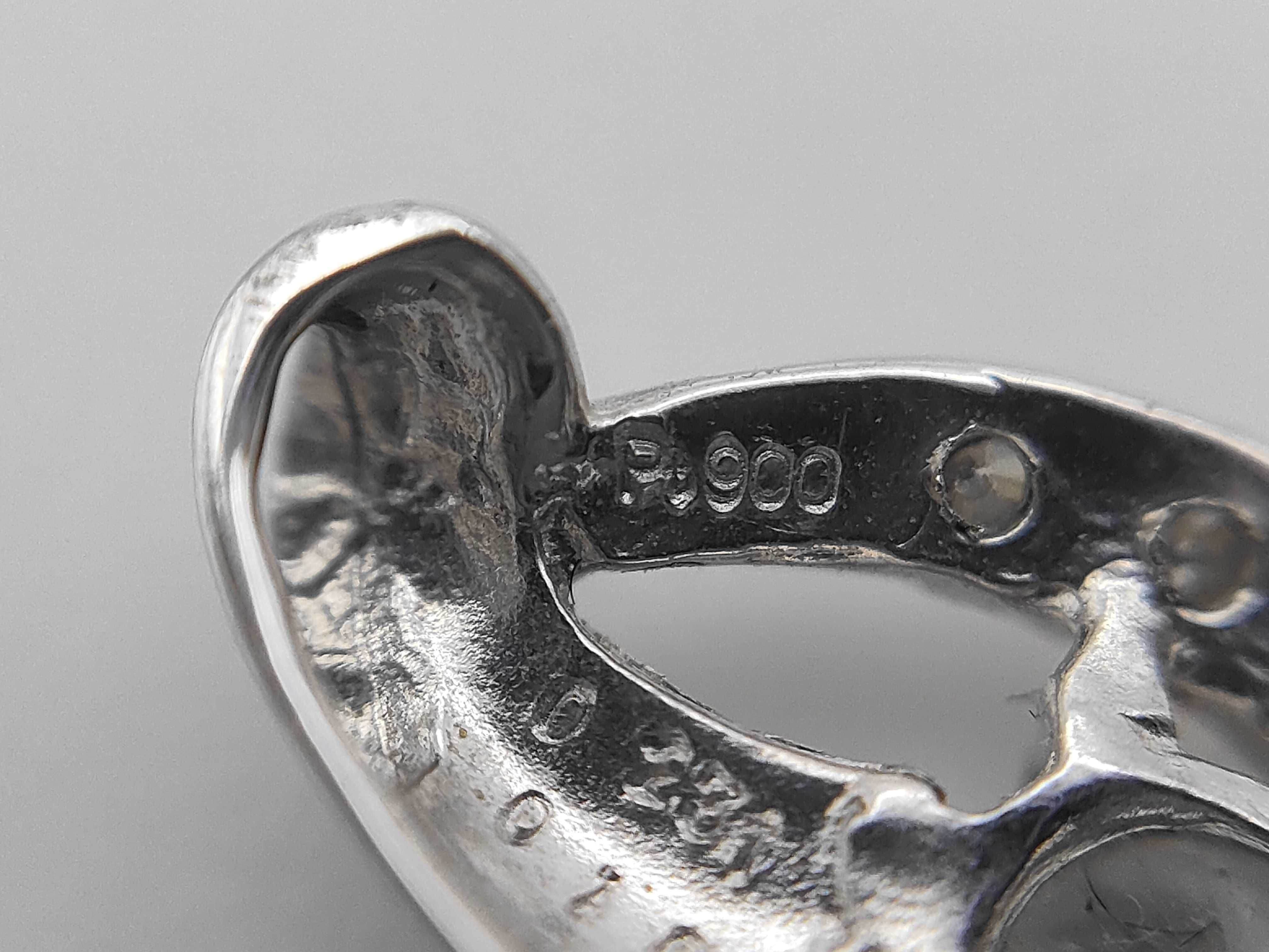 Platinum and Diamond Bypass Pendant with CGL Grading Report
