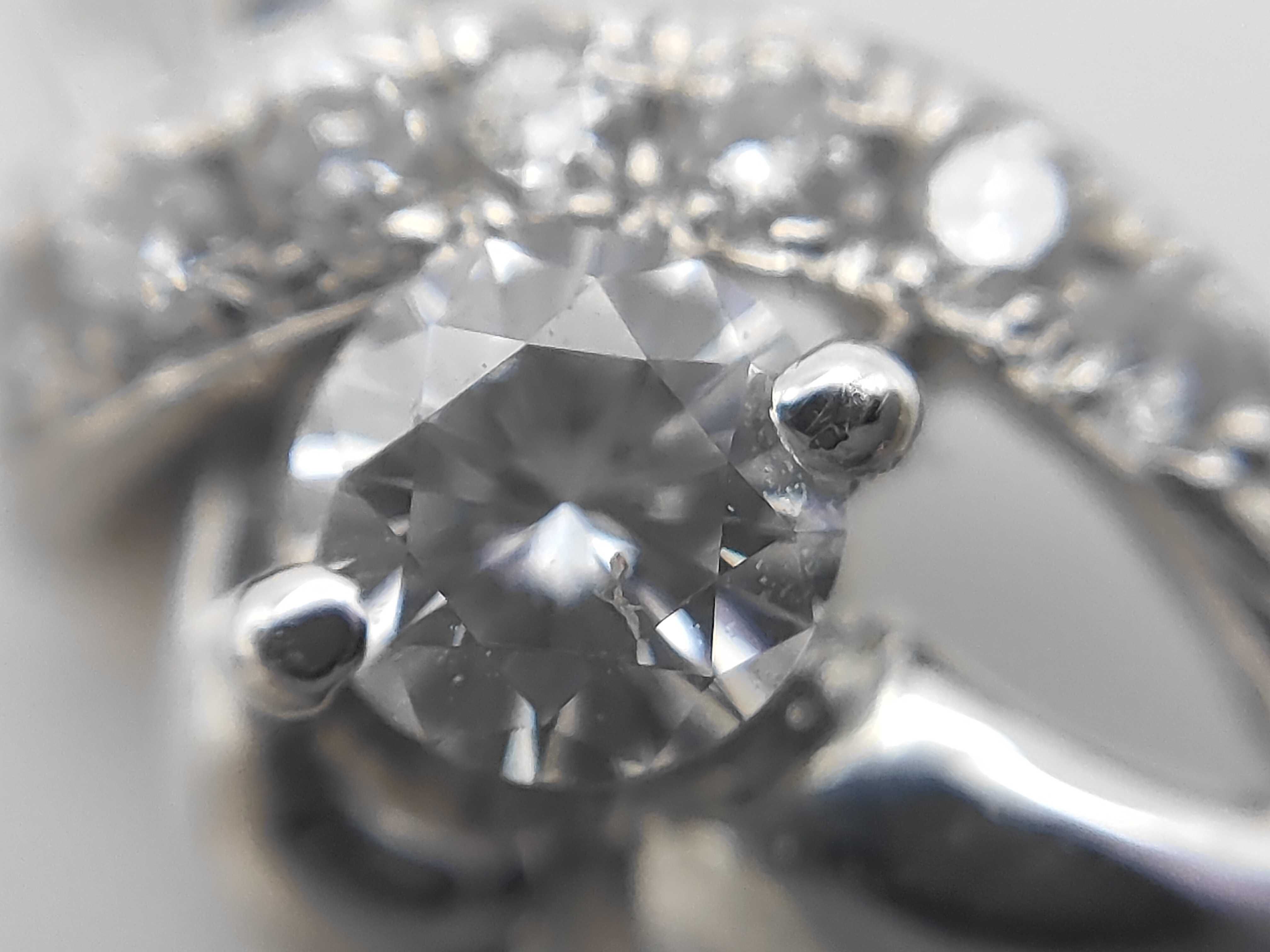 Platinum and Diamond Bypass Pendant with CGL Grading Report