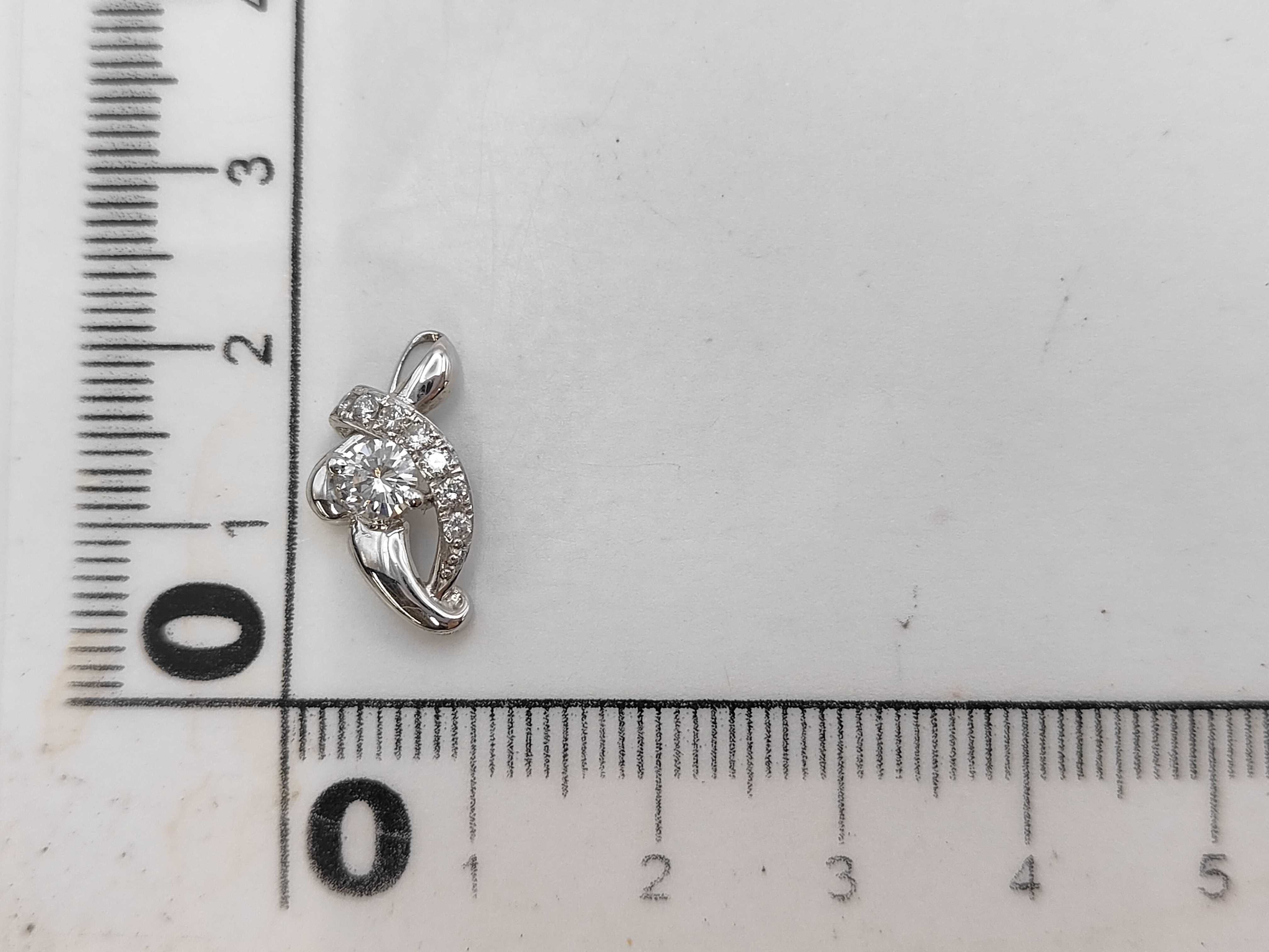 Platinum and Diamond Bypass Pendant with CGL Grading Report