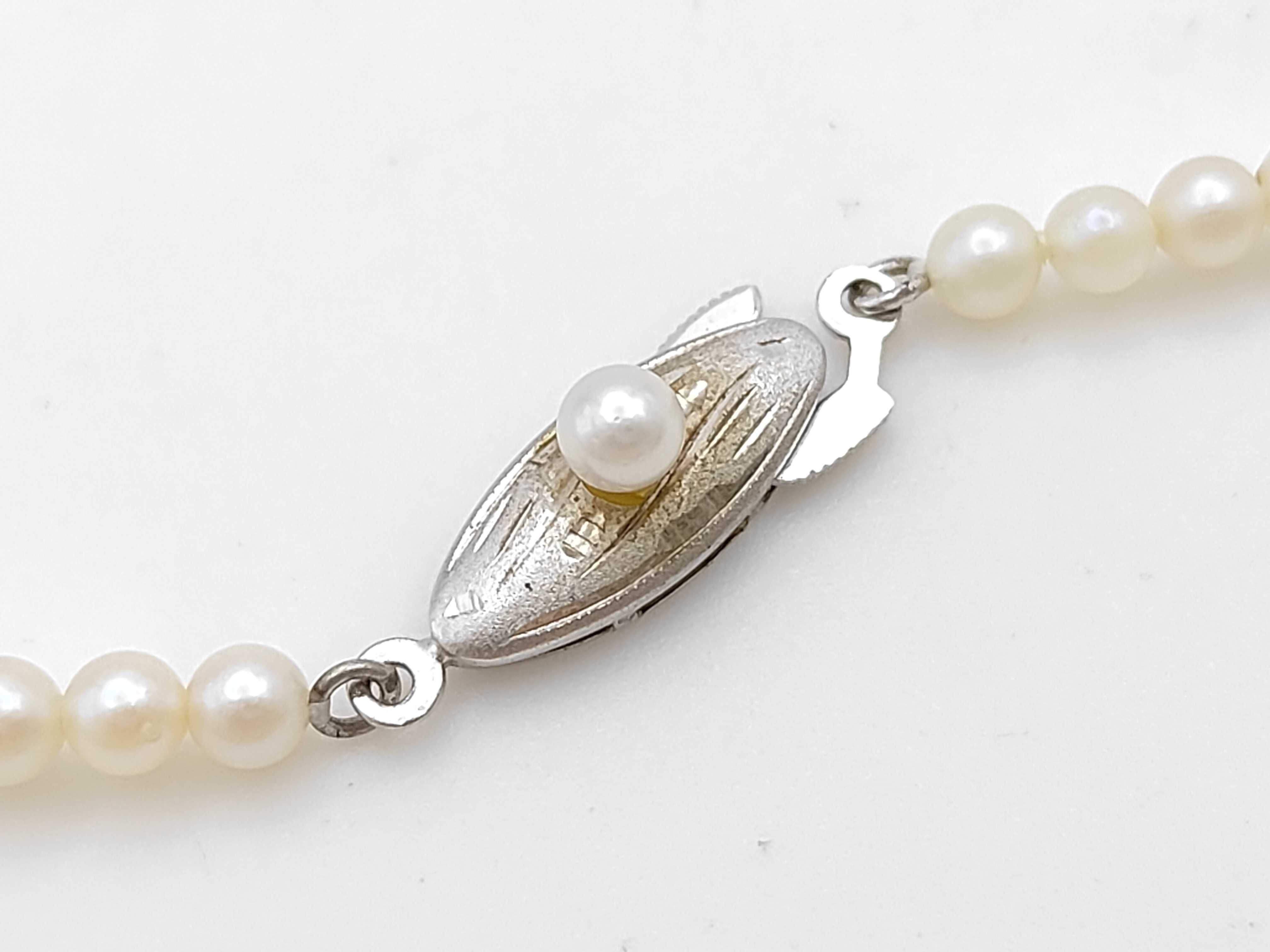 Vintage Graduated Semi-Round Pearl Necklace with Silver Clasp