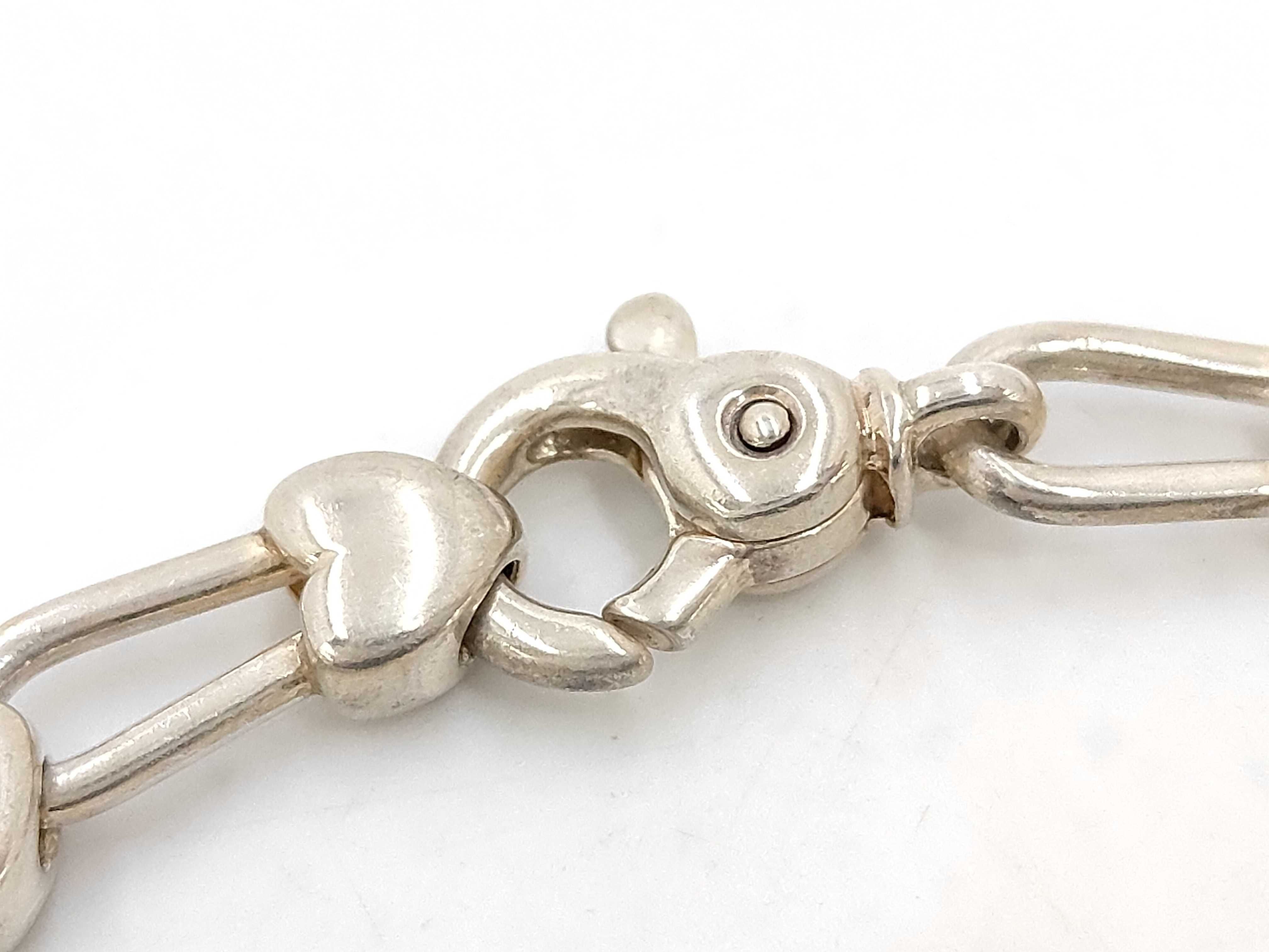 Tiffany and Co. Sterling Silver and 18 Karat Yellow Gold Heart Link Bracelet