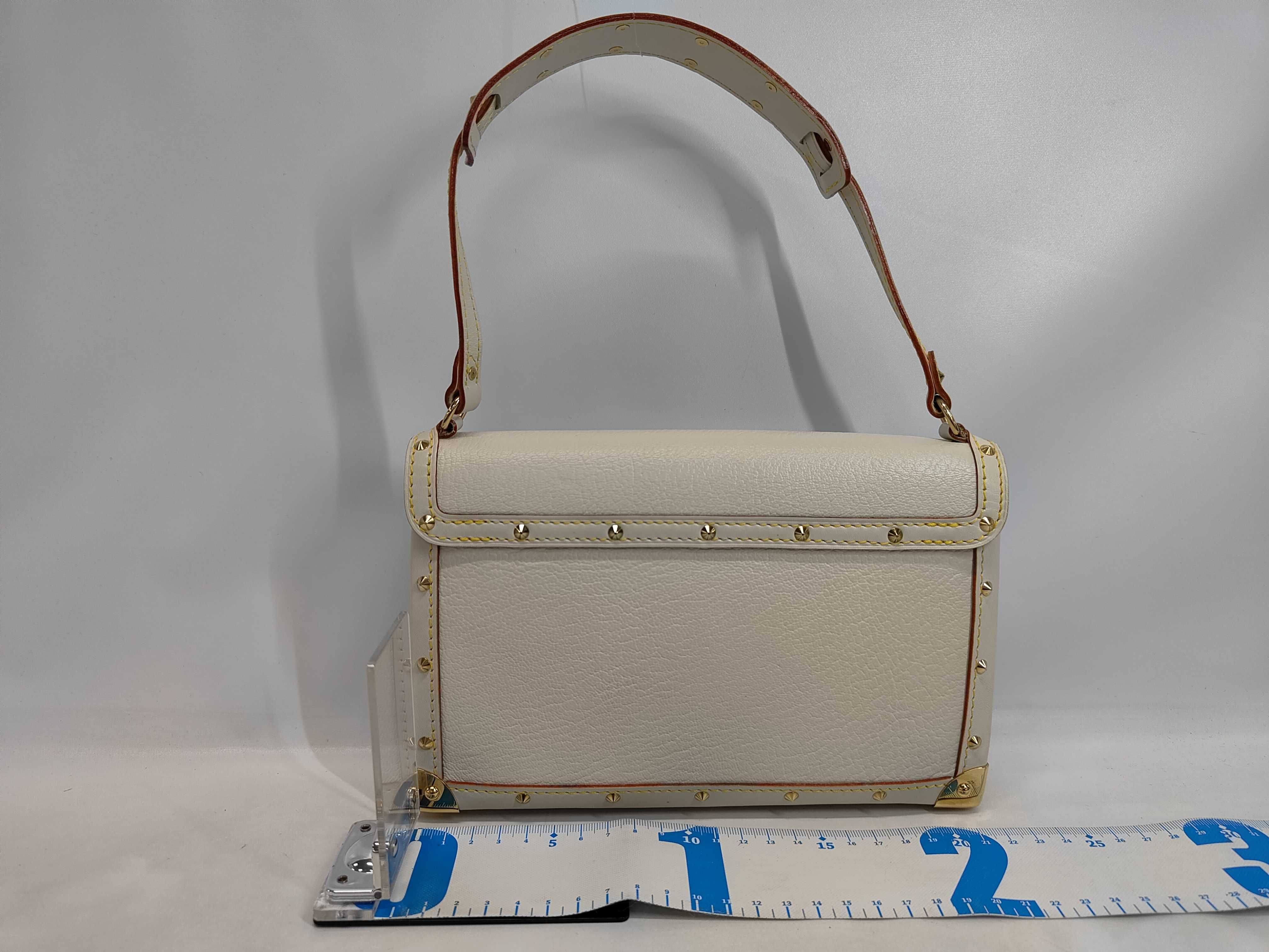 Louis Vuitton Le Talentueux Suhali Leather Handbag