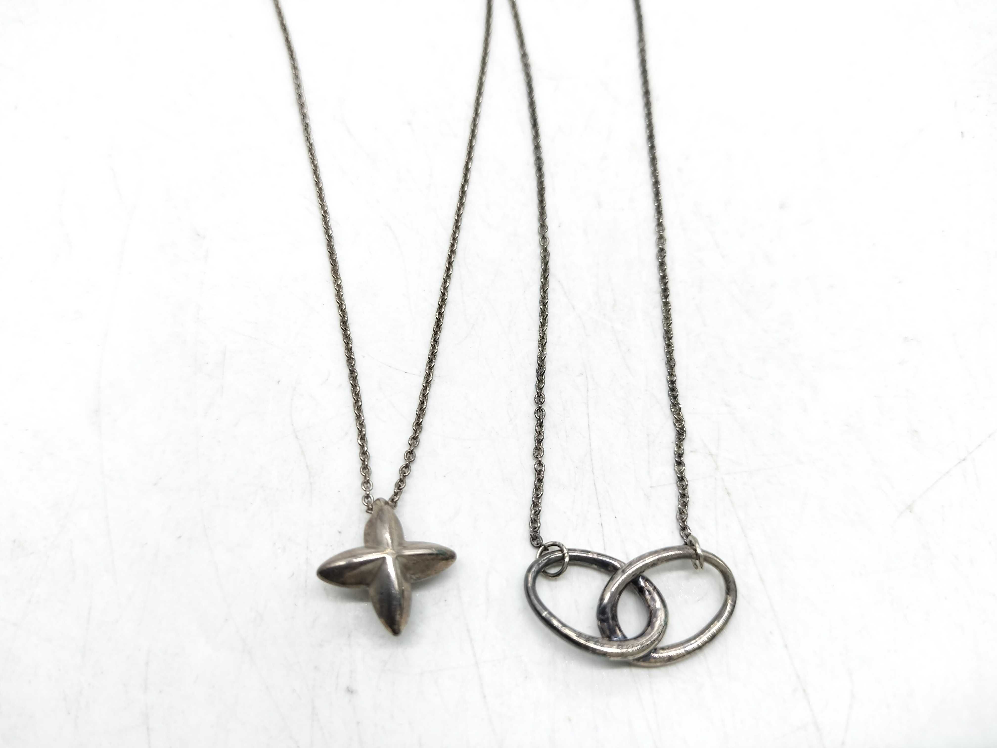Two Tiffany and Co. Elsa Peretti Sterling Silver Star and Interlocking Circles Necklaces
