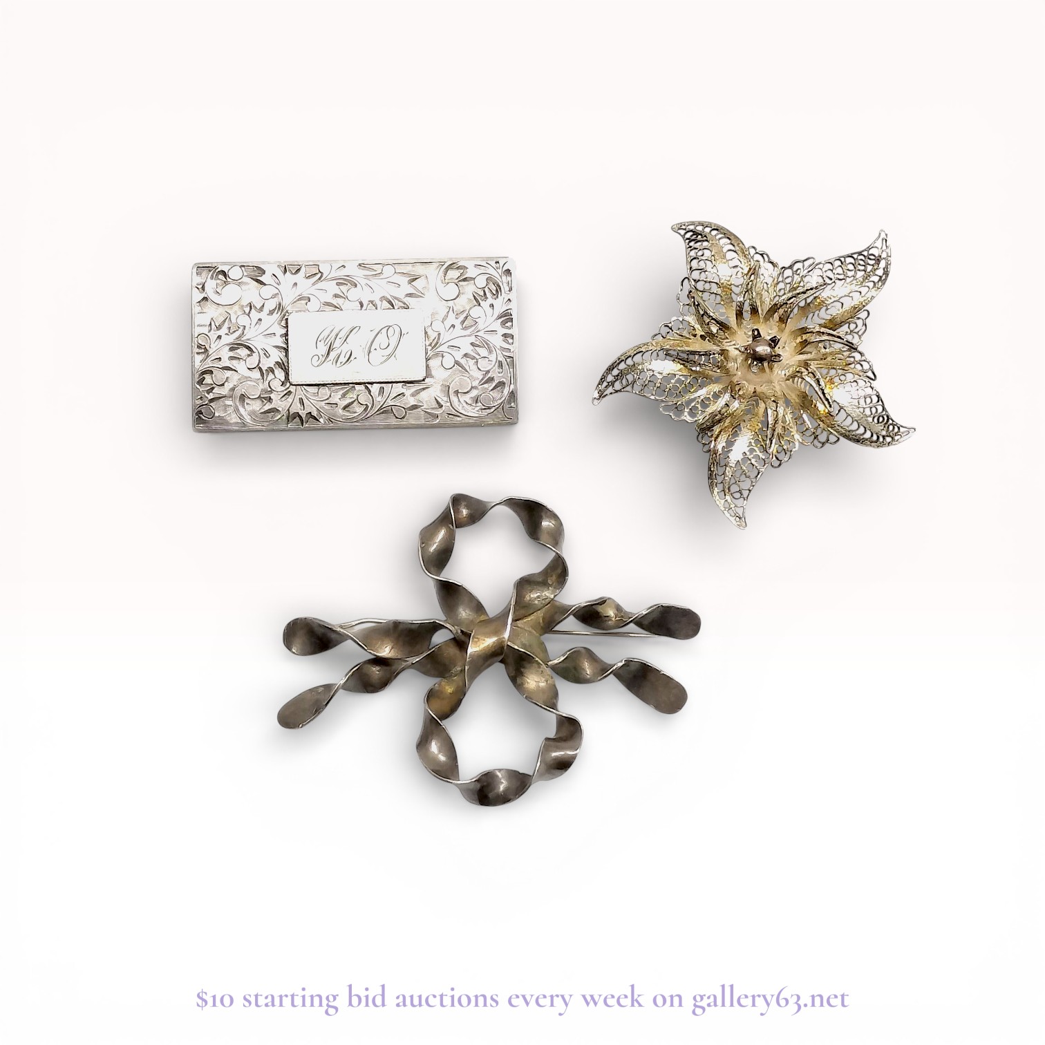 A Trio of Vintage Silver and Silver-Tone Brooches
