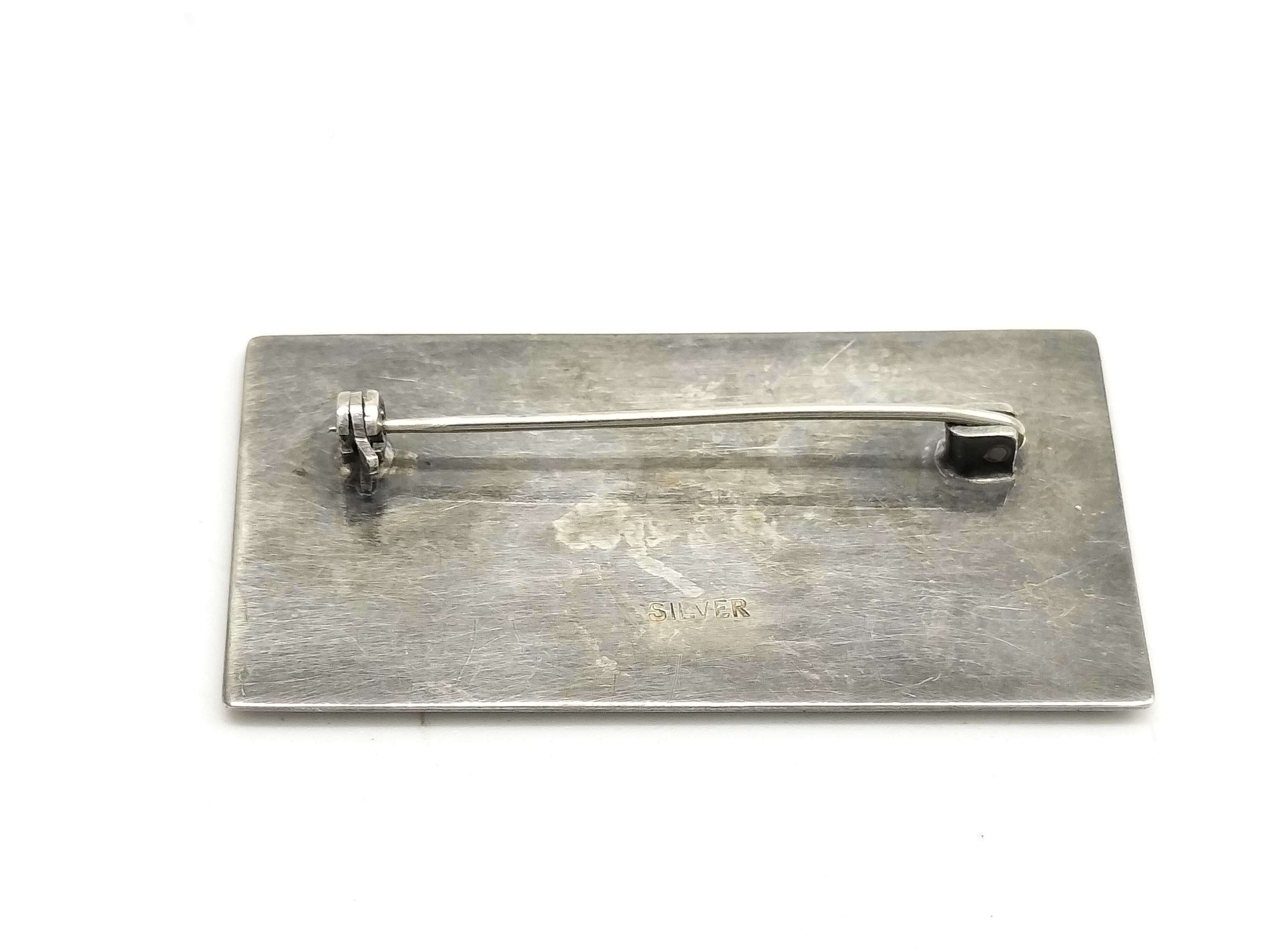 A Trio of Vintage Silver and Silver-Tone Brooches