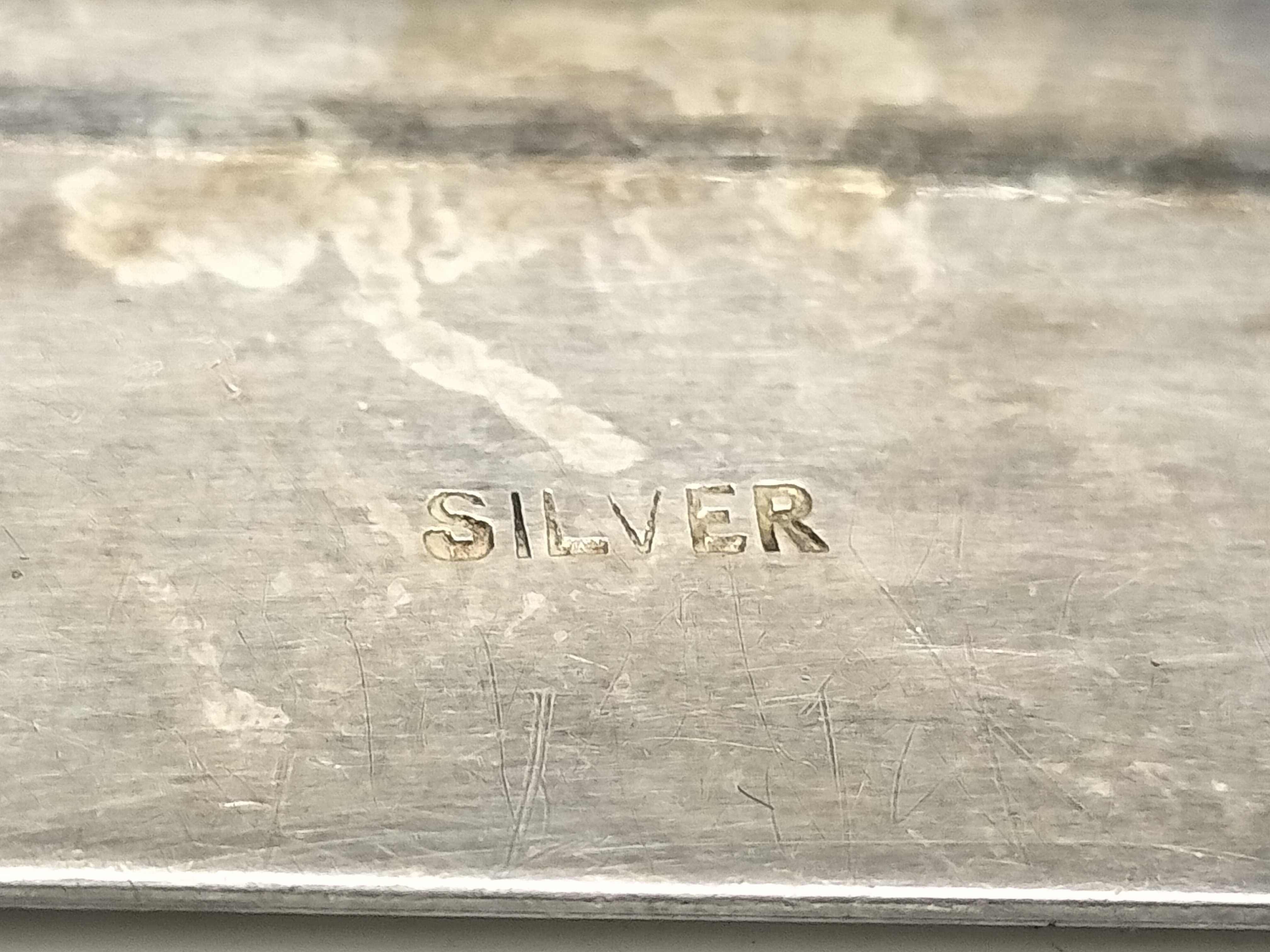 A Trio of Vintage Silver and Silver-Tone Brooches