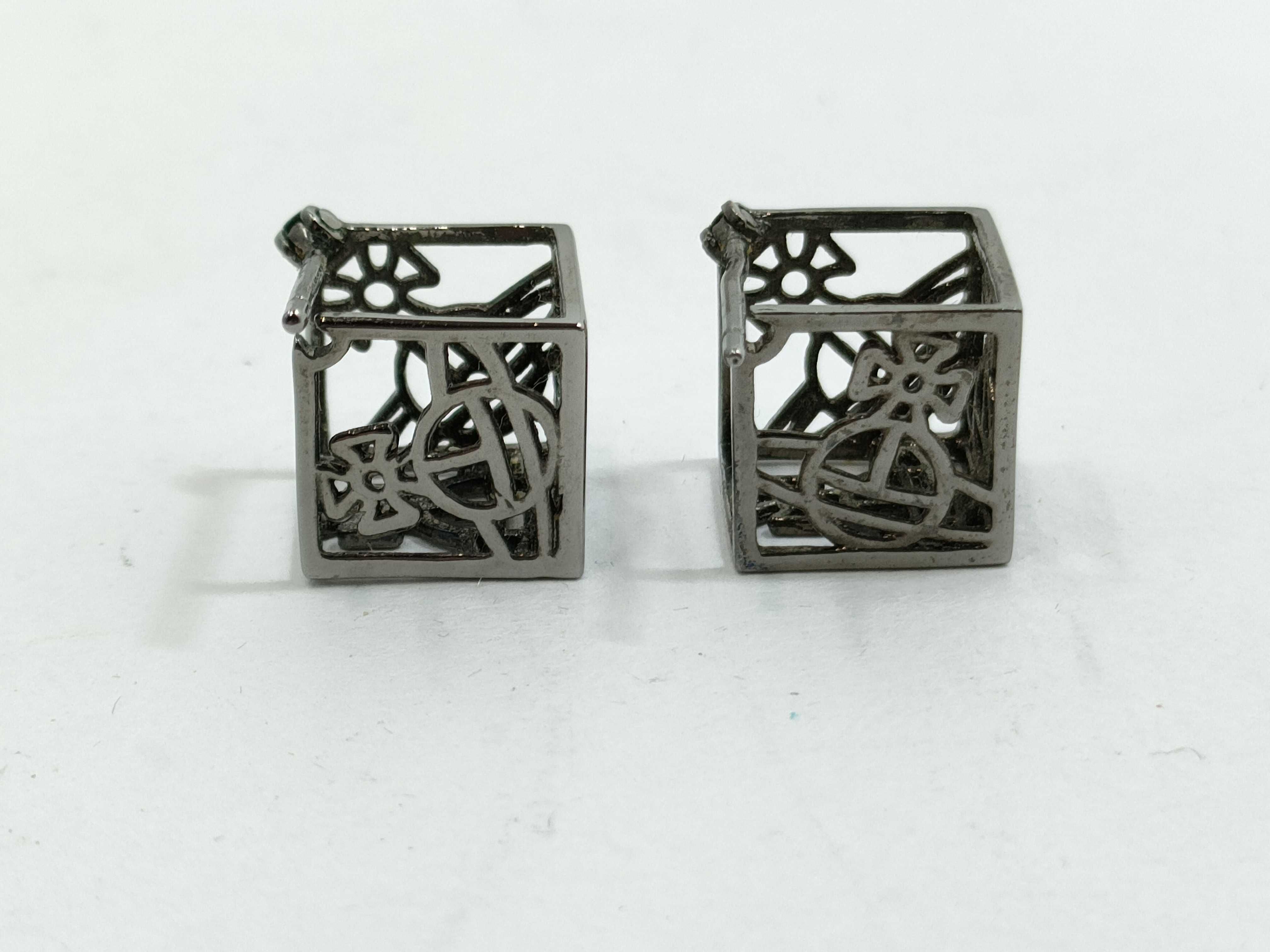 A Pair of Vivienne Westwood Gunmetal-Tone Cube Stud Earrings with Orb Motif
