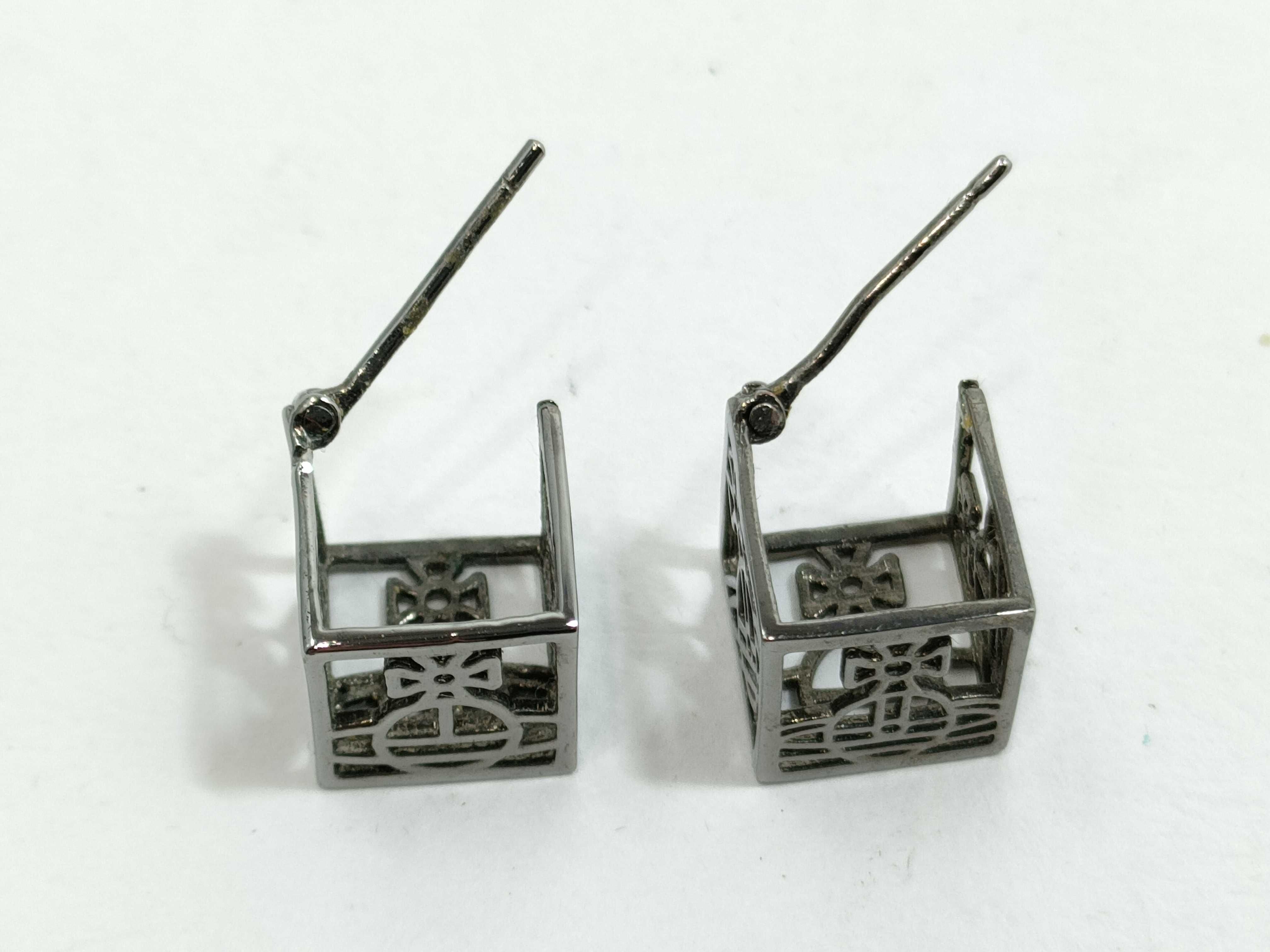A Pair of Vivienne Westwood Gunmetal-Tone Cube Stud Earrings with Orb Motif