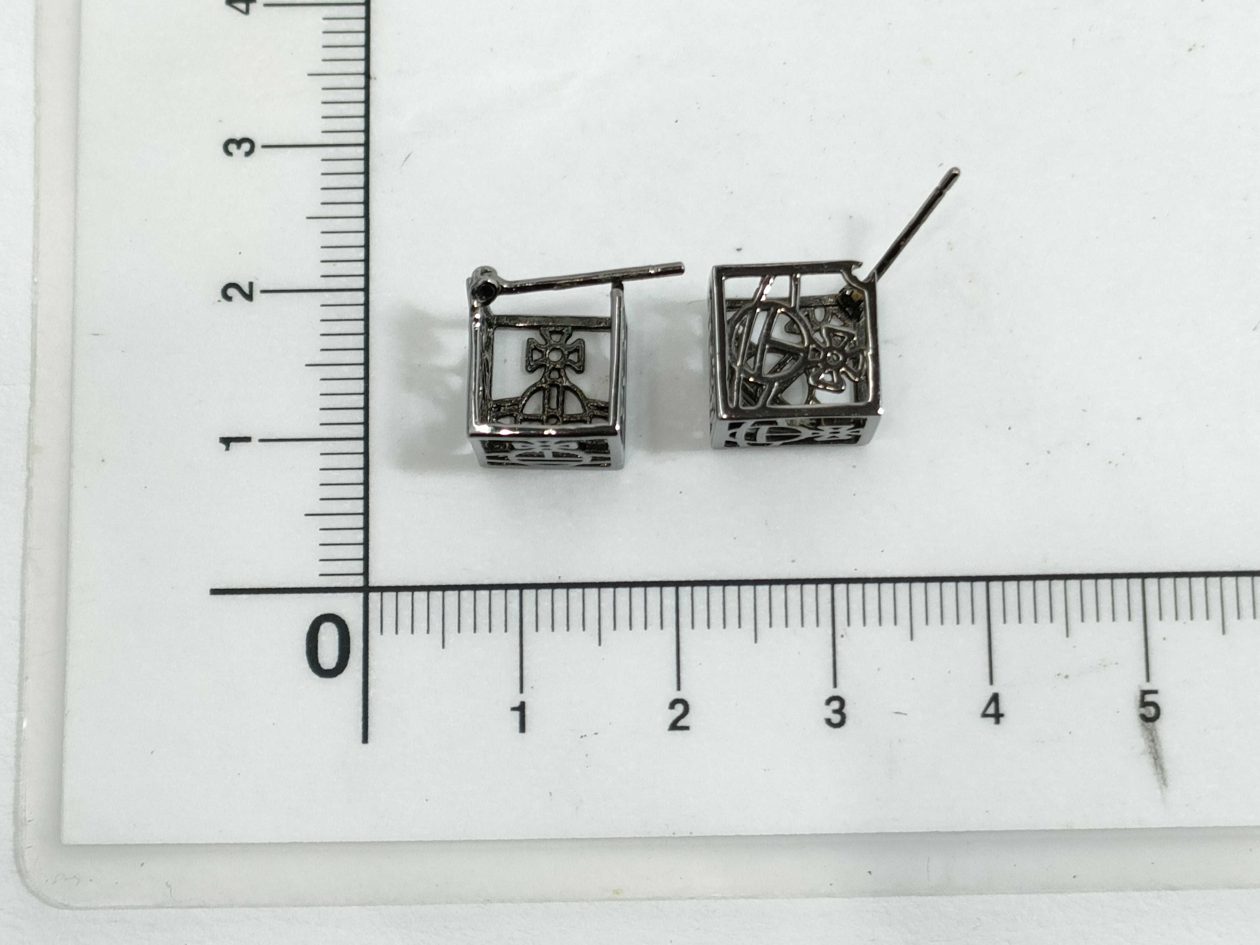 A Pair of Vivienne Westwood Gunmetal-Tone Cube Stud Earrings with Orb Motif