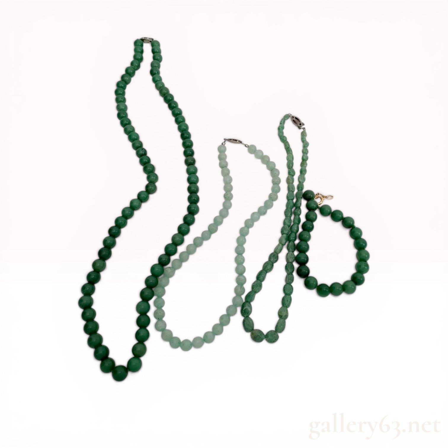 A Collection of Jadeite, Aventurine, and Beaded Stone Necklaces/Bracelets
