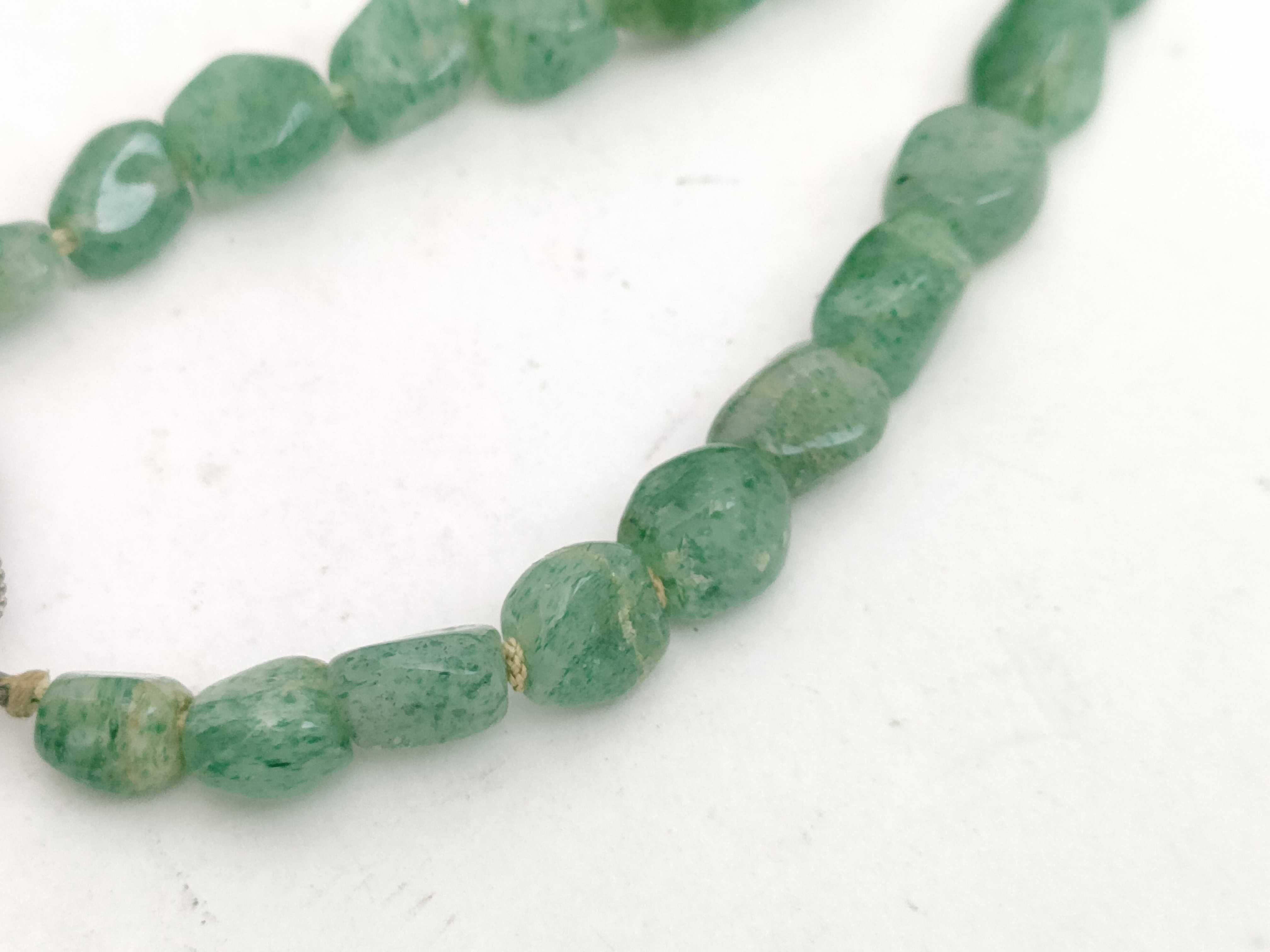 A Collection of Jadeite, Aventurine, and Beaded Stone Necklaces/Bracelets