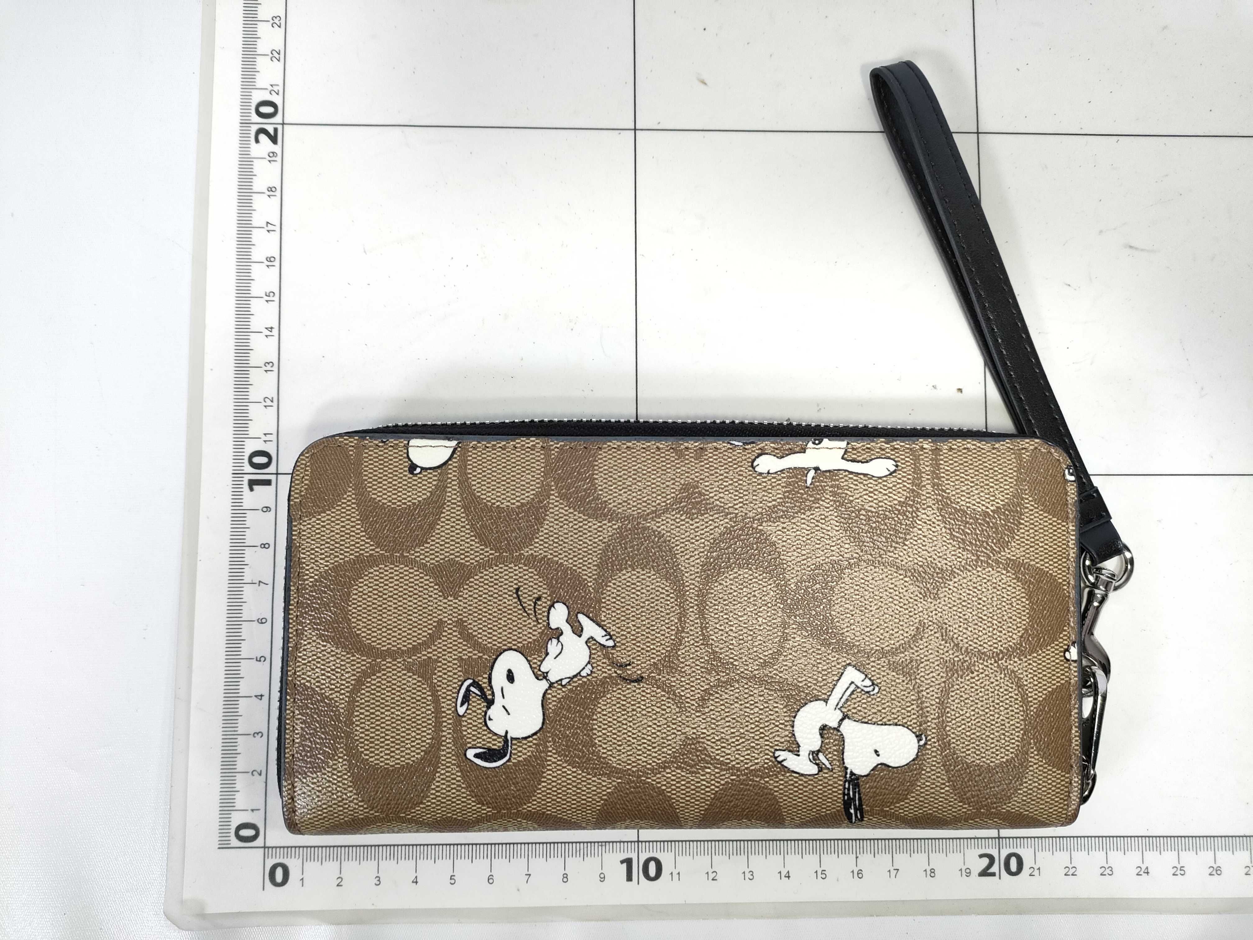 COACH x PEANUTS Long Zip Around Wallet in Signature Canvas with Snoopy